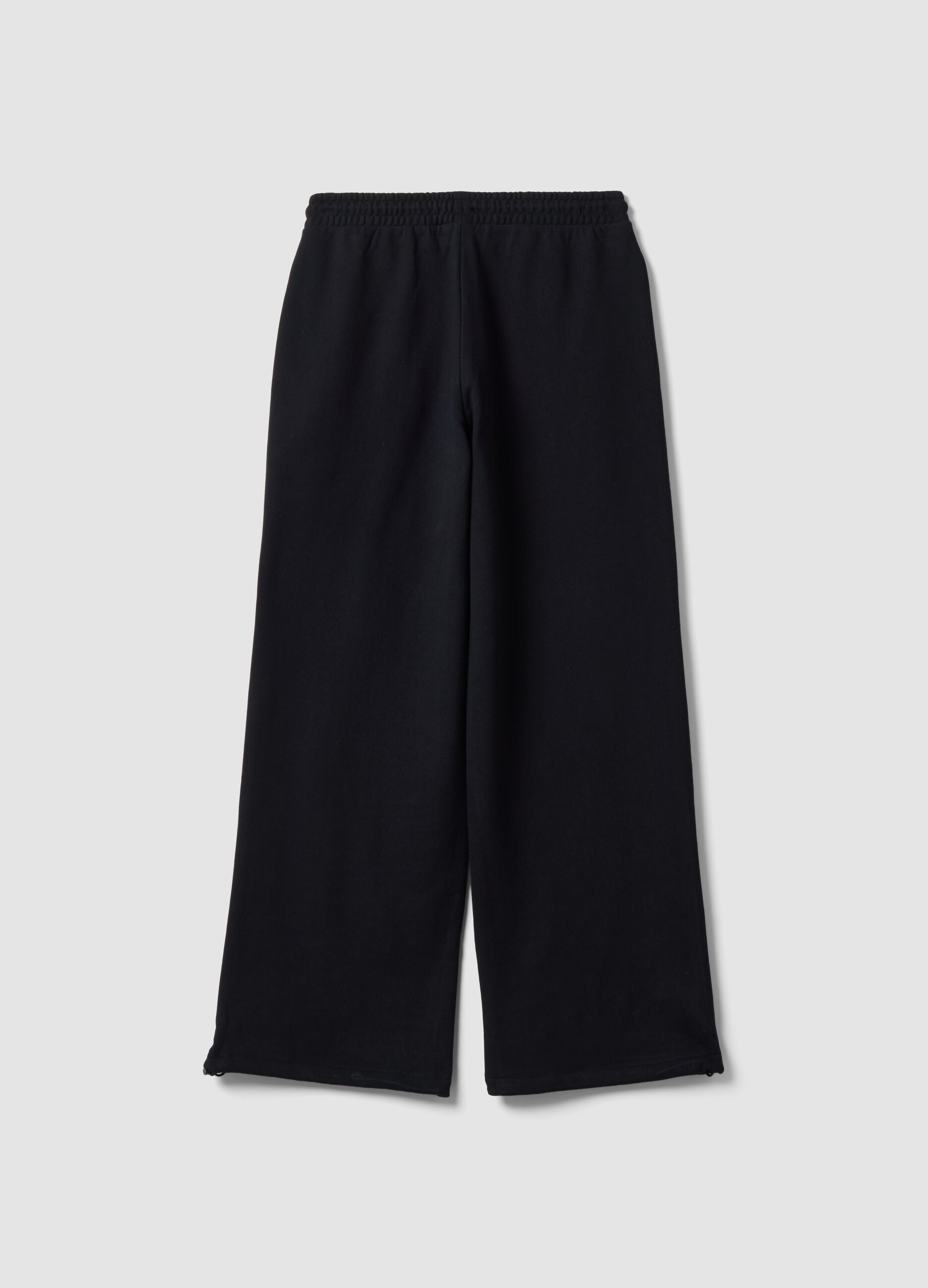 Black pure cotton joggers with elasticated waistband, oversized fit