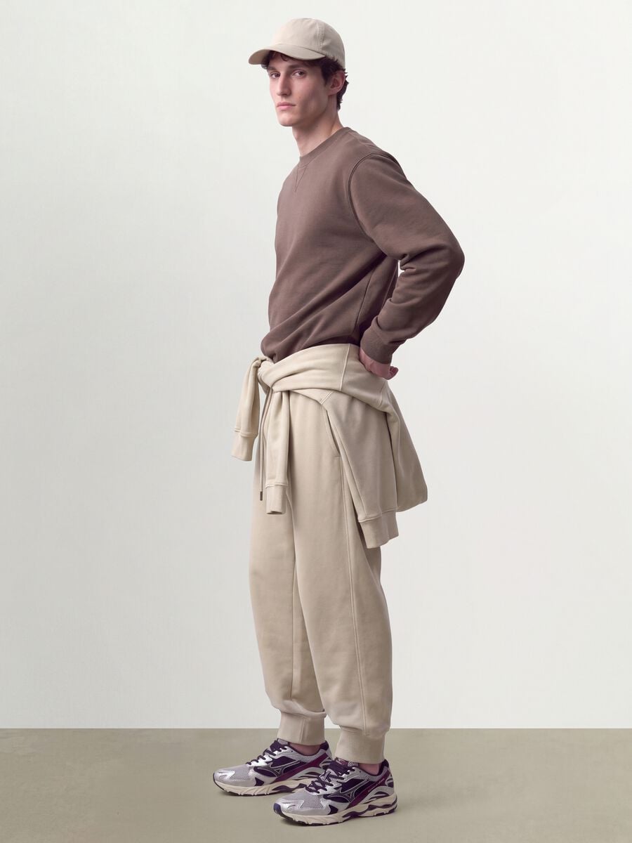 Beige cotton-blend joggers with cuffed hems and drawstring_1