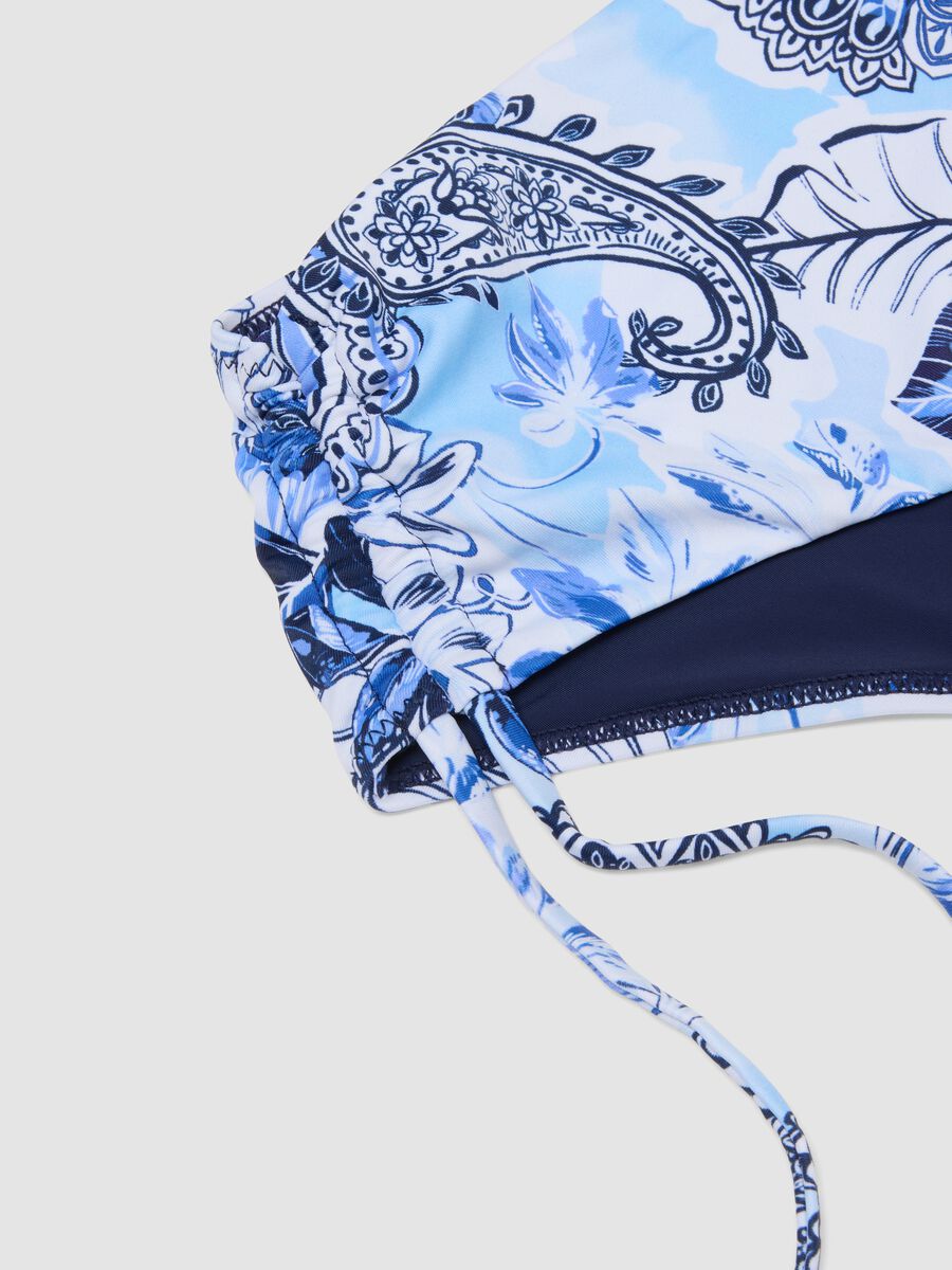 Slip bikini azzurro in tessuto elasticizzato con laccetti laterali_5