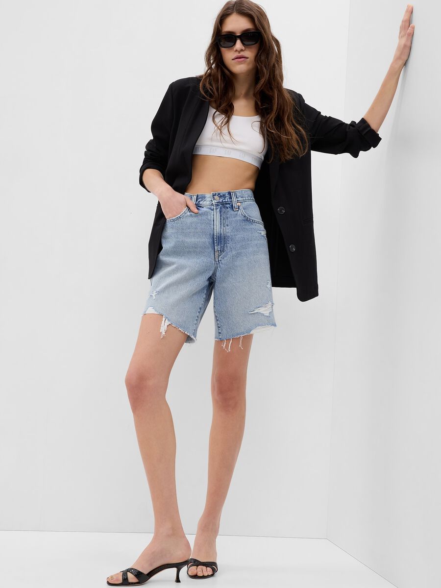 Loose-fit Bermuda shorts in denim shorts with abrasions_0