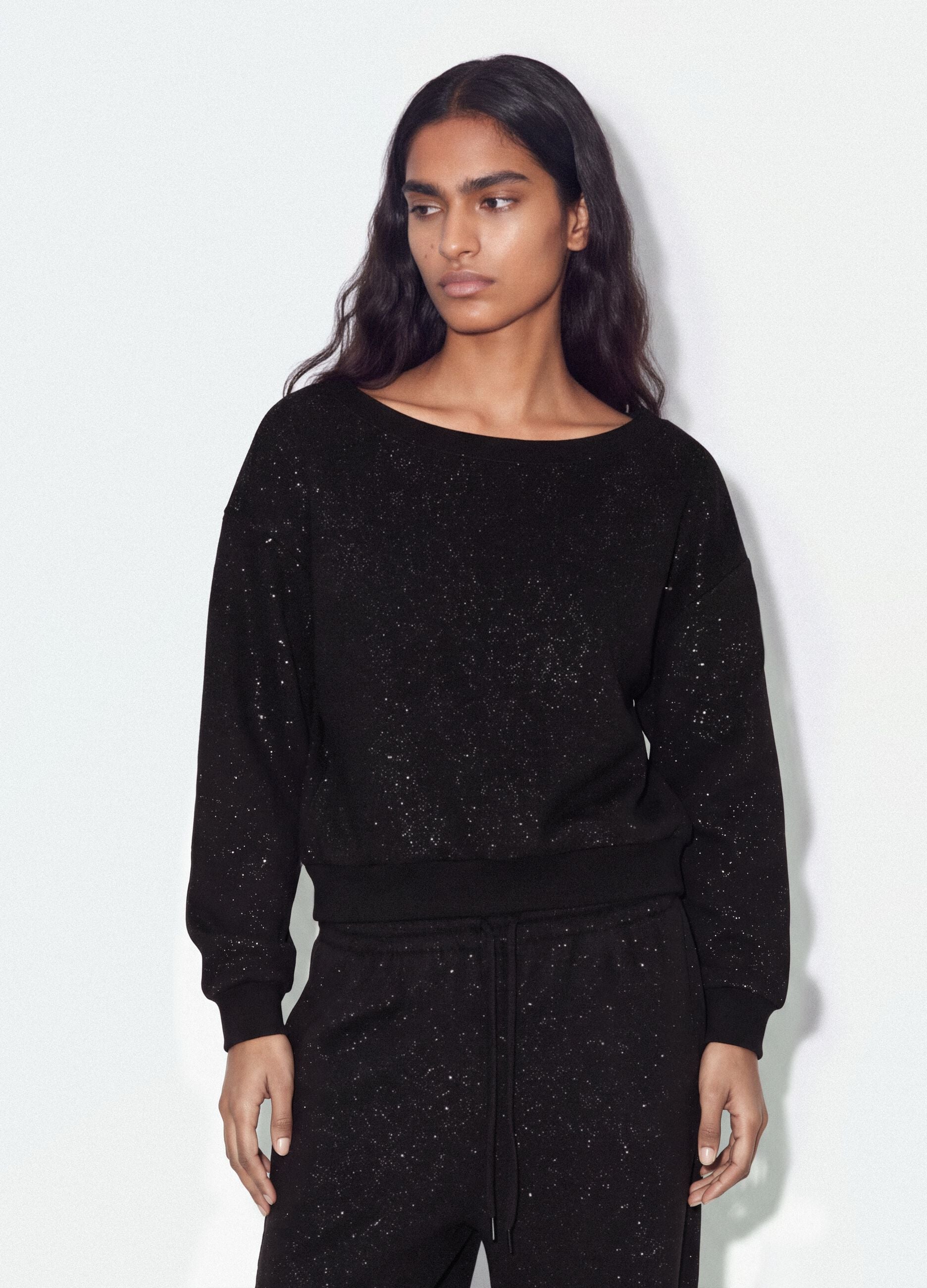 Black cotton-blend sweatshirt with bateau neckline and glitter