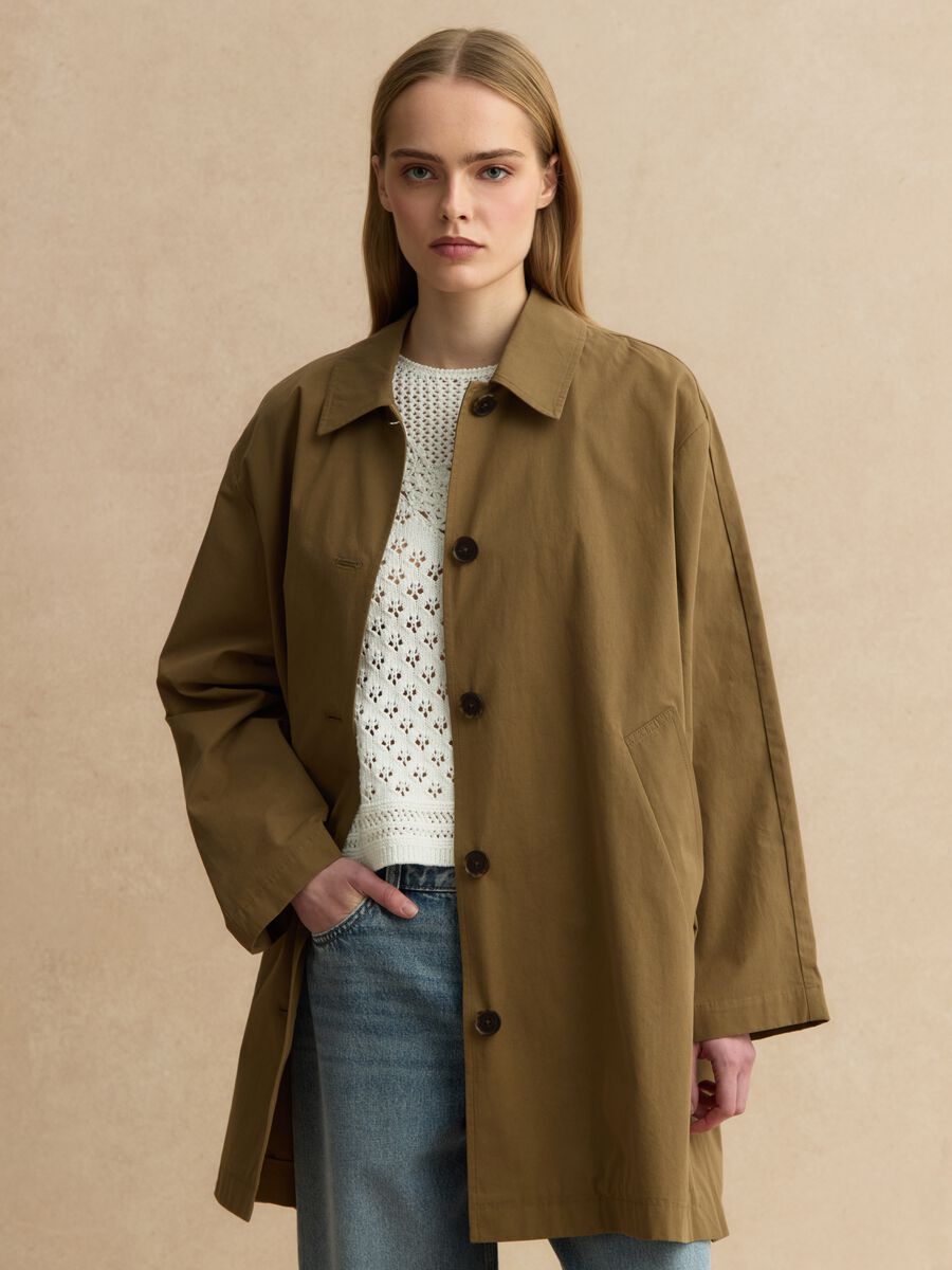 Trench con mantella removibile verde in puro cotone_1