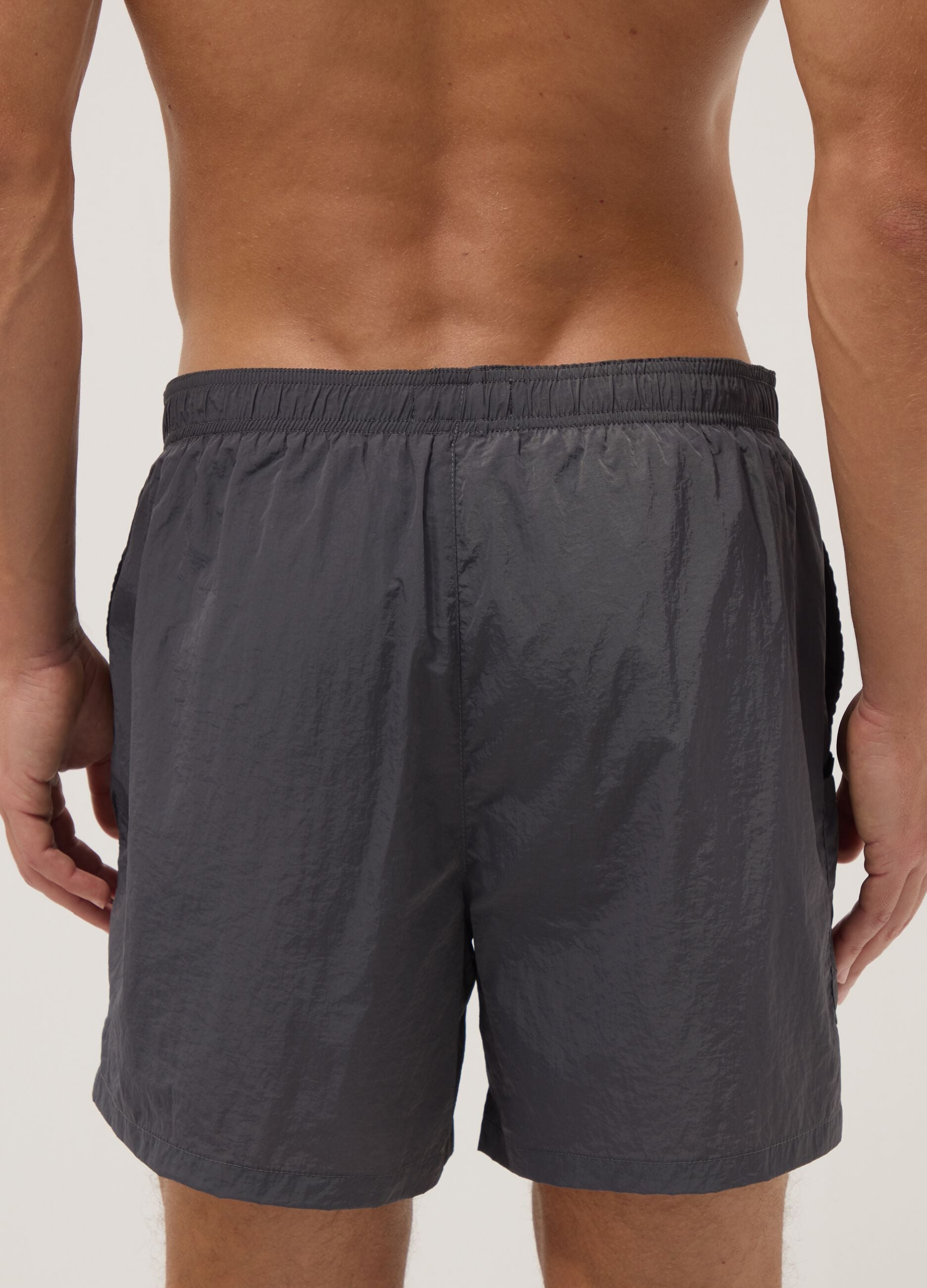 Grey swim shorts with elasticated waist