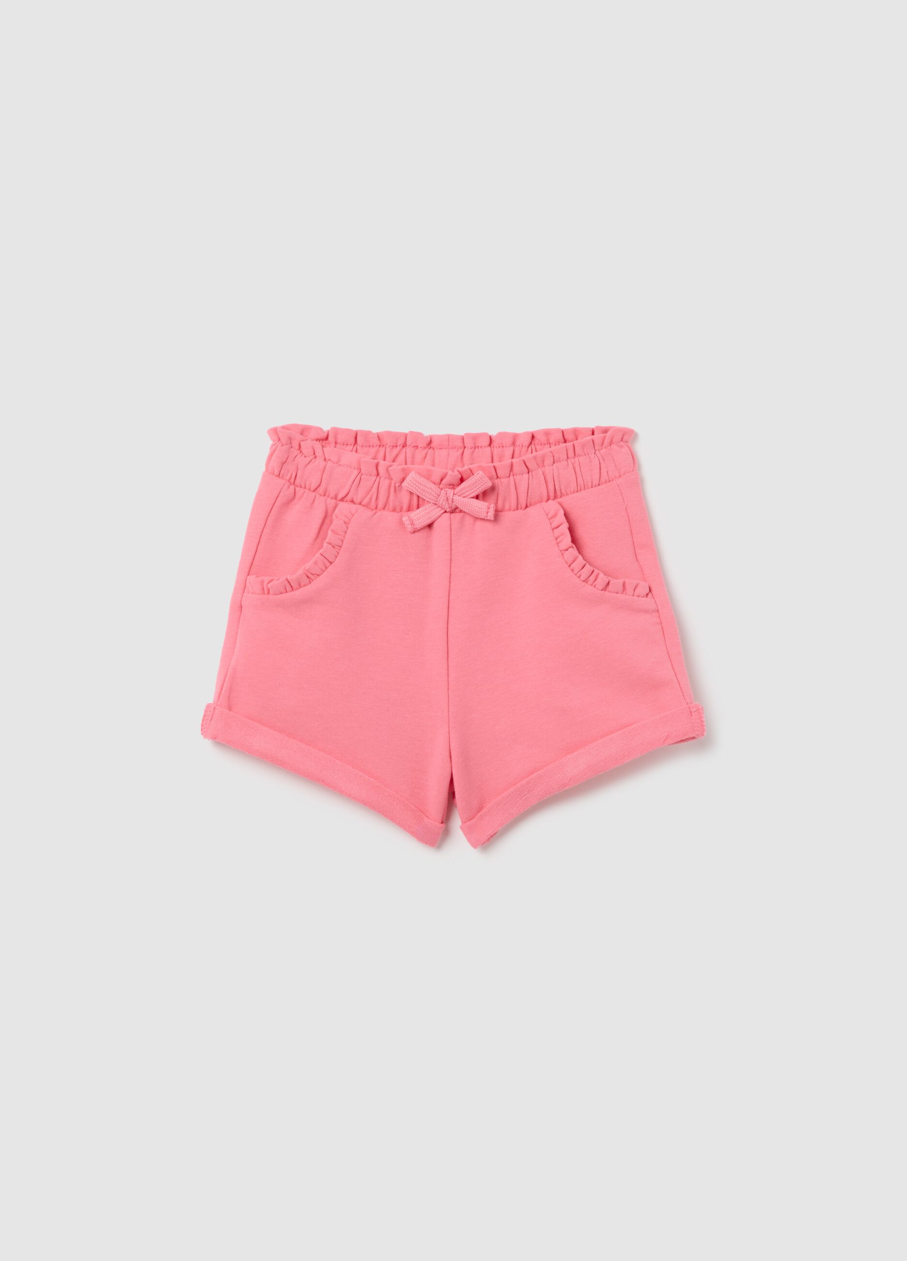 Pink French terry shorts with bow and frills