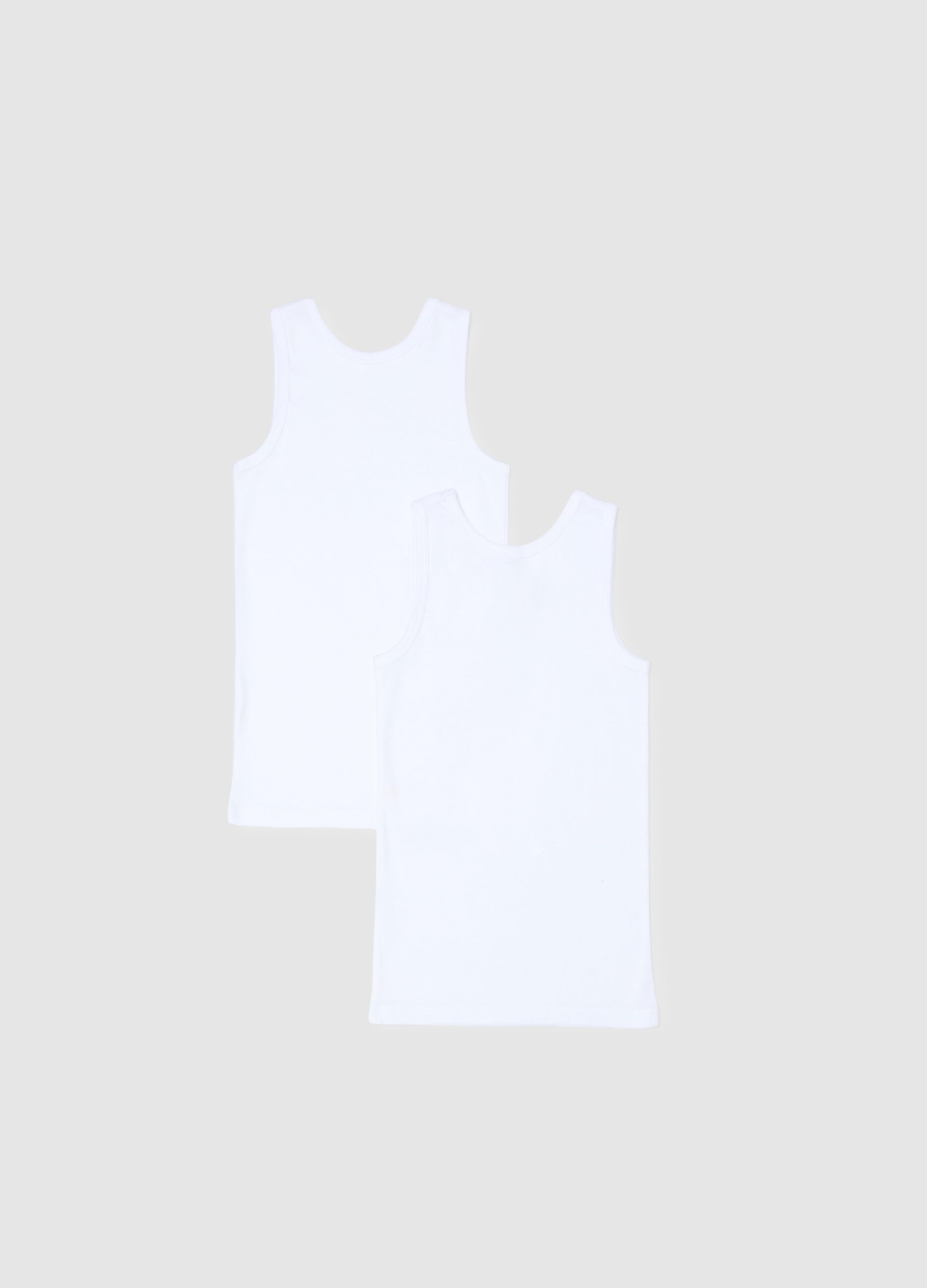 Pack of two boys' white cotton vests with a regular fit