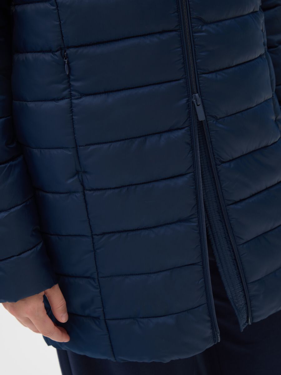 Long padded blue jacket with hood and zip_3