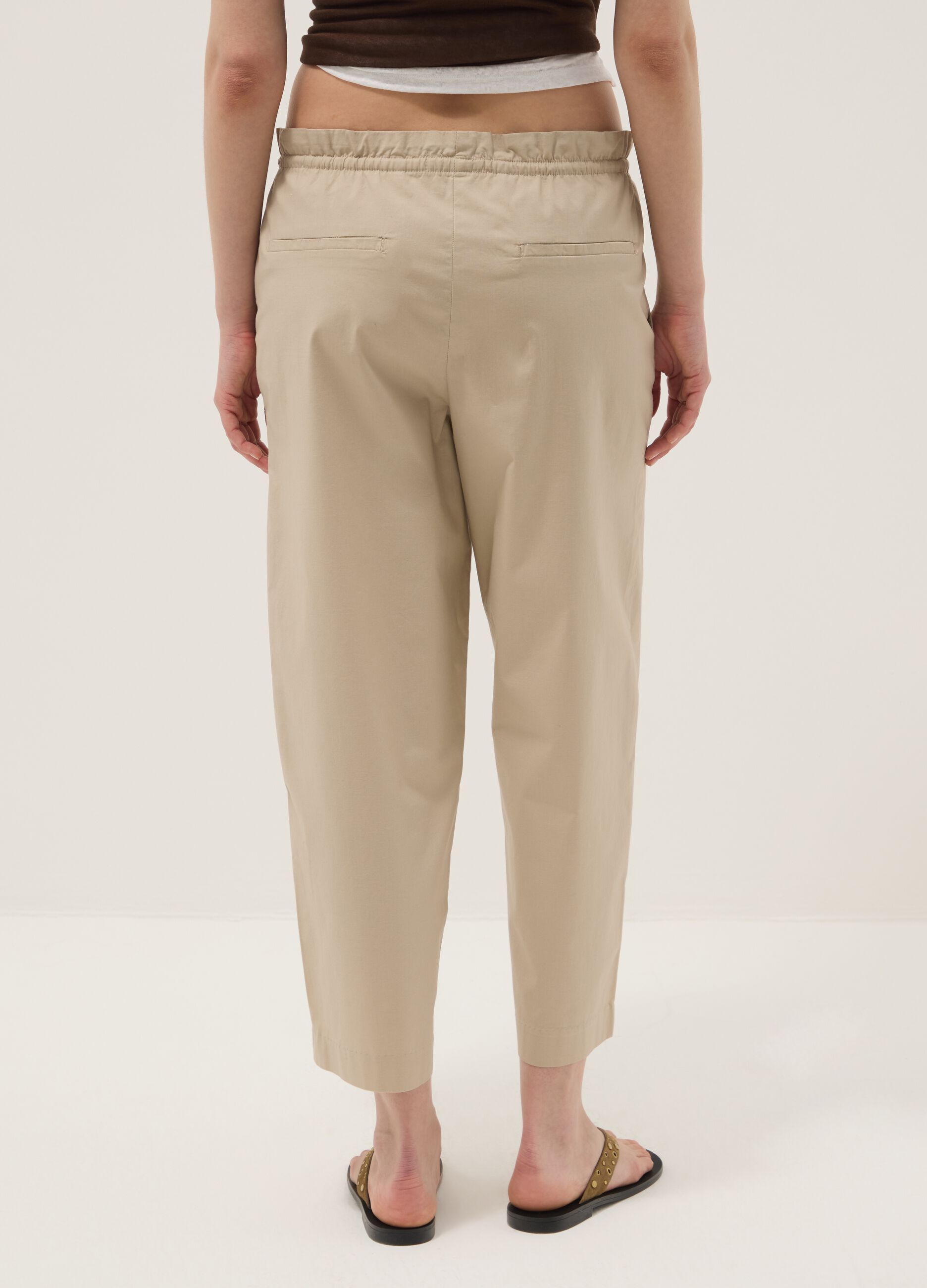 Beige stretch-cotton trousers with elasticated waistband