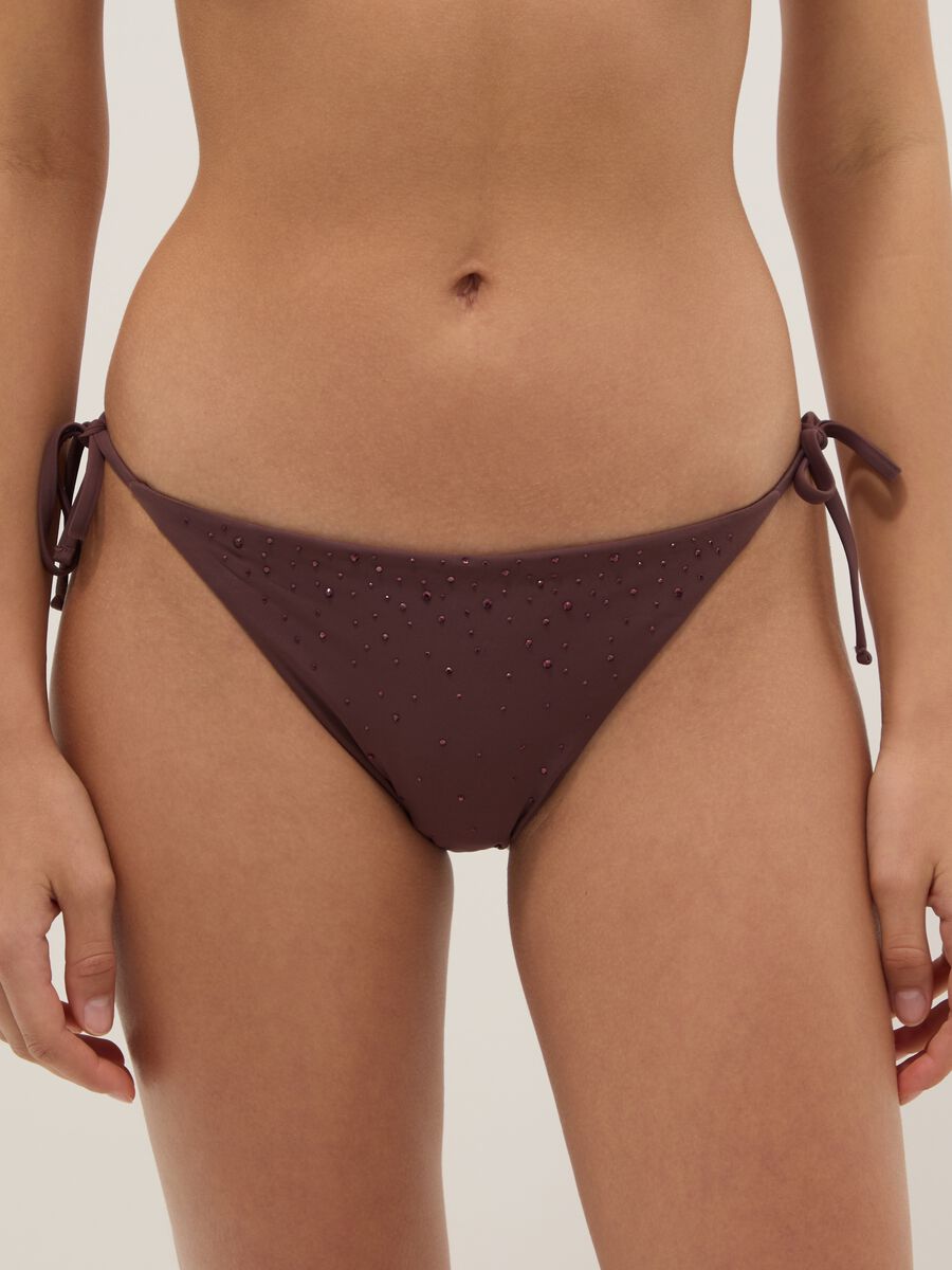 Brown stretch bikini bottoms with shimmering details_1
