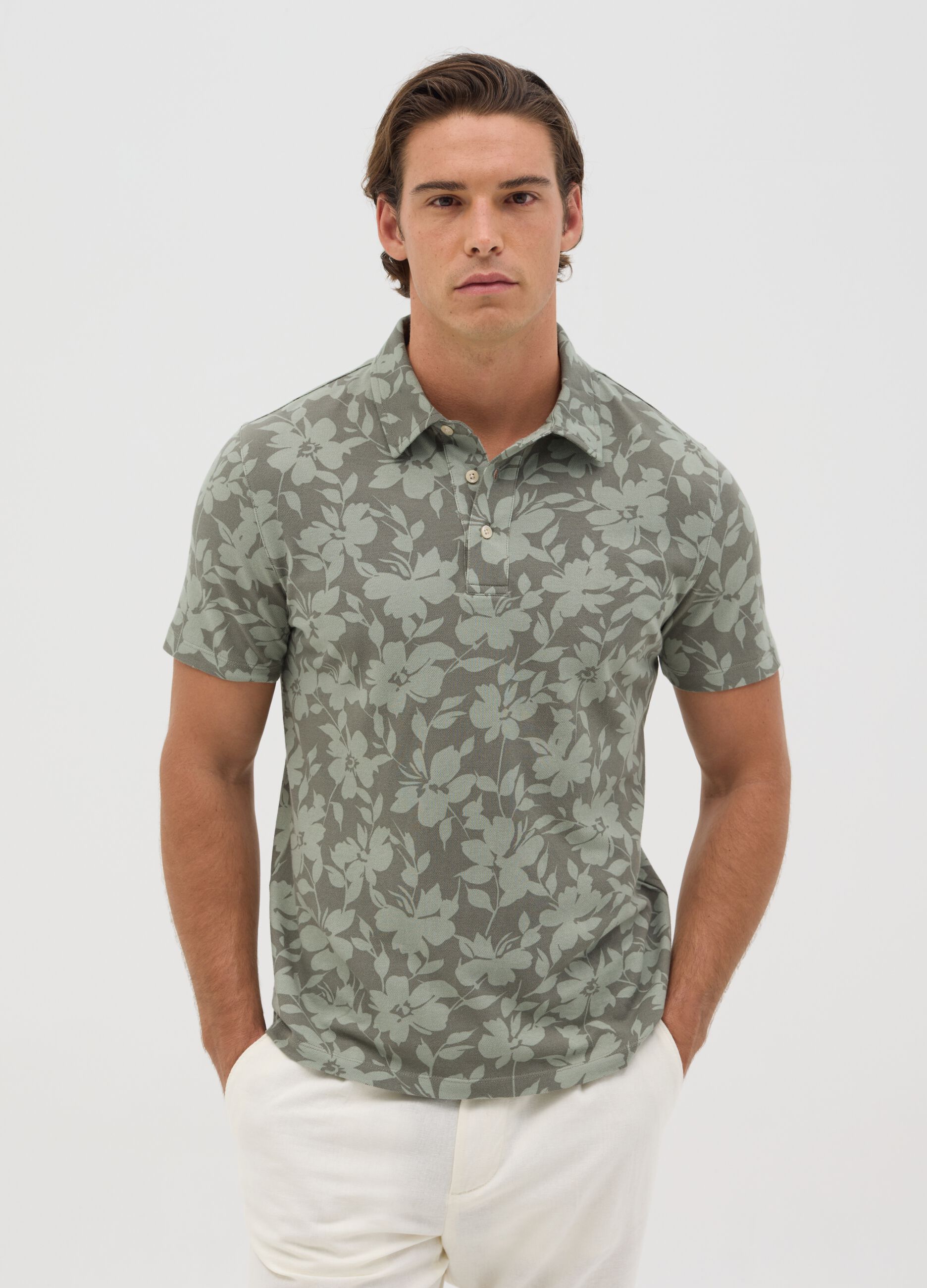 Polo a maniche corte verde con stampa floreale BST