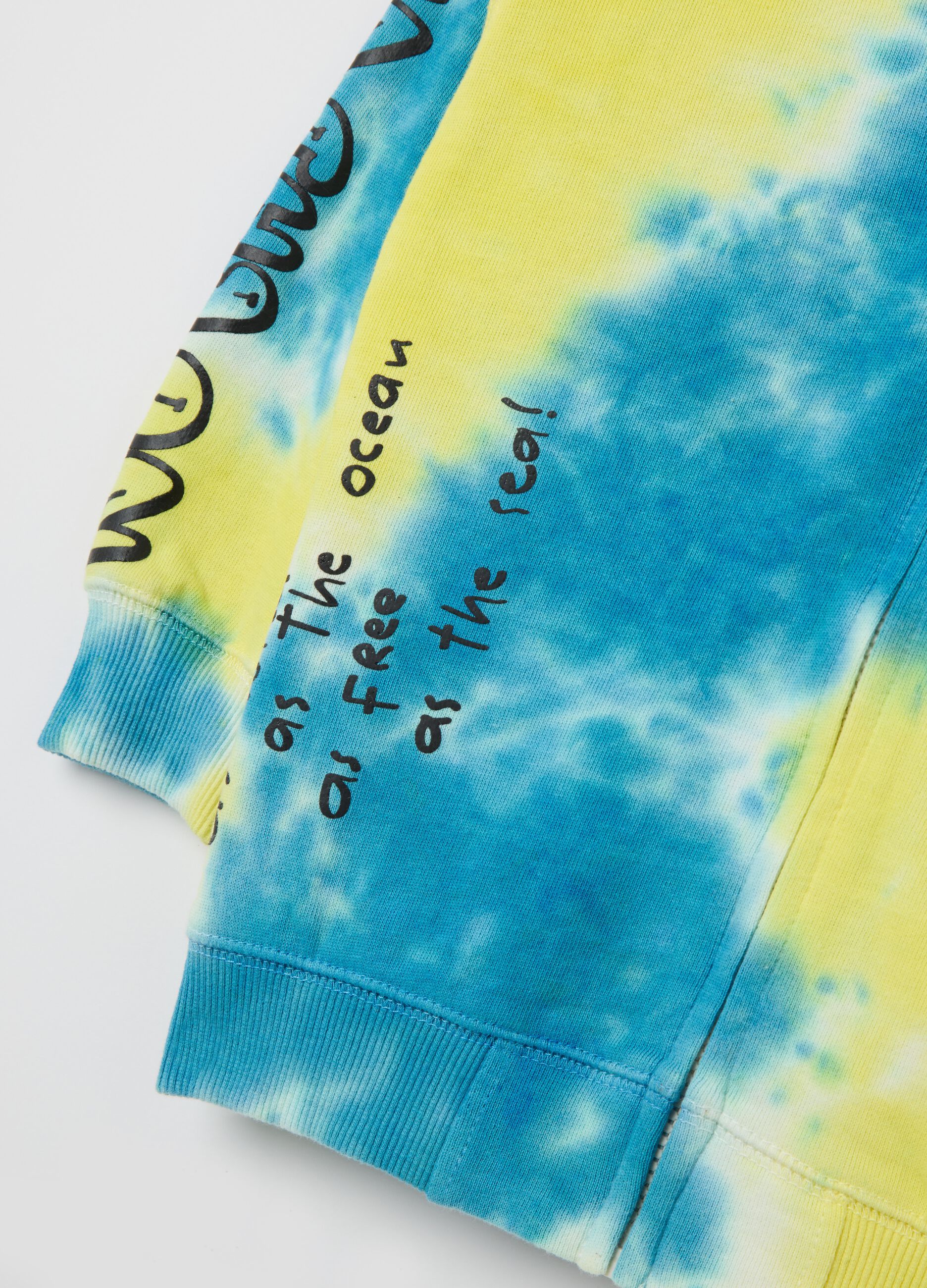 Blue and yellow full-zip sweatshirt with tie dye pattern, hood and print