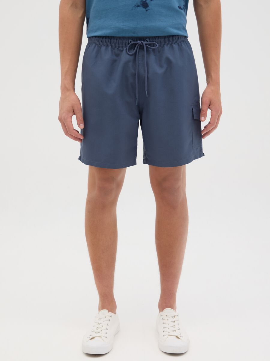 Blue swimming trunks with logo print_1
