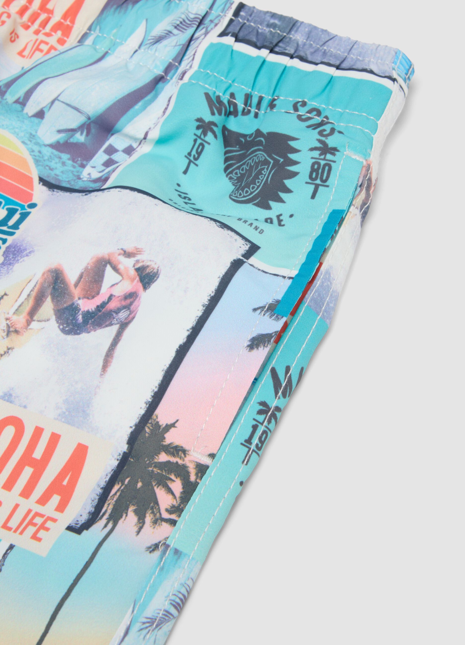 Multicoloured tropical print swim shorts