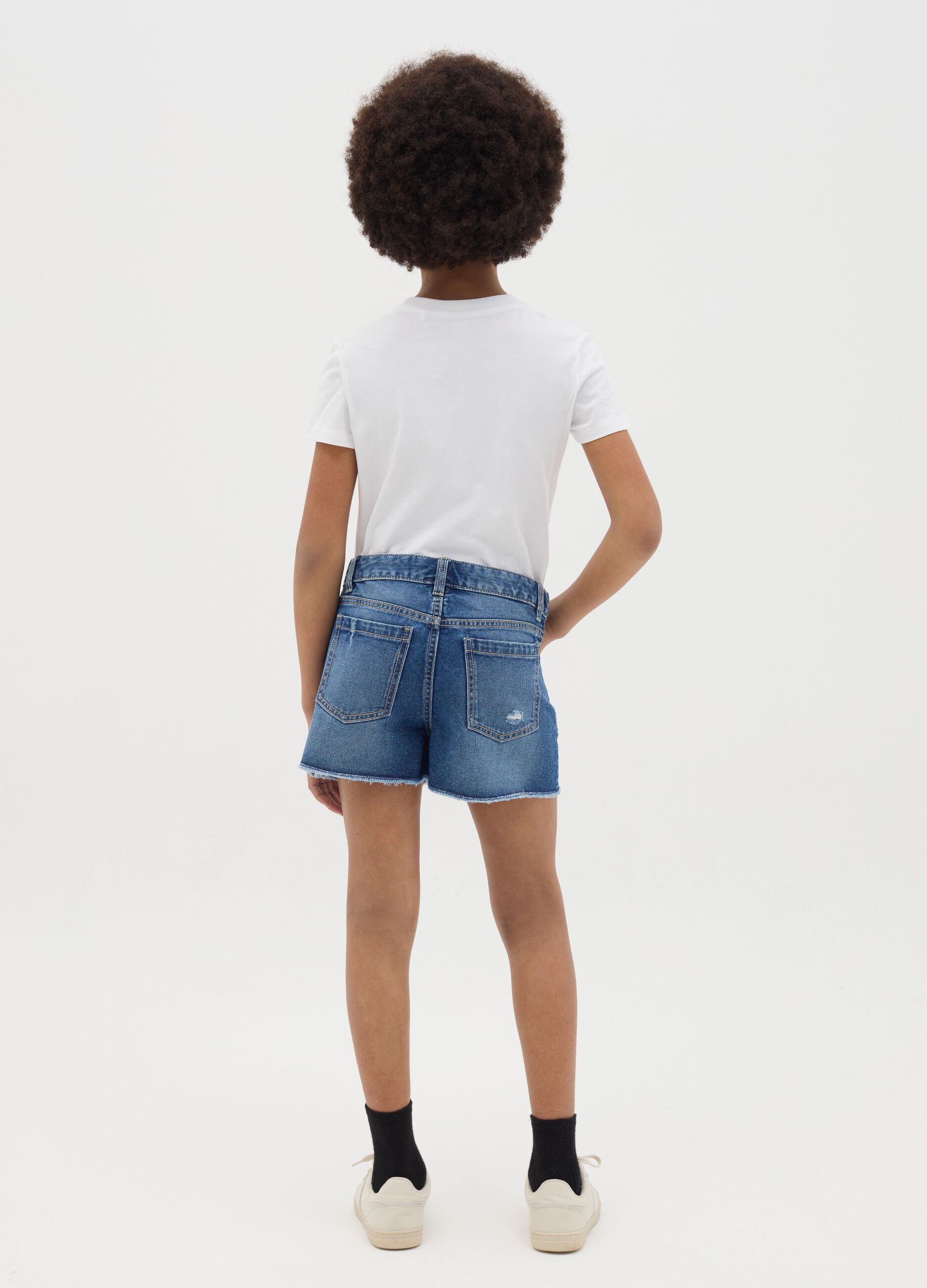 Denim shorts with five pockets and abrasions