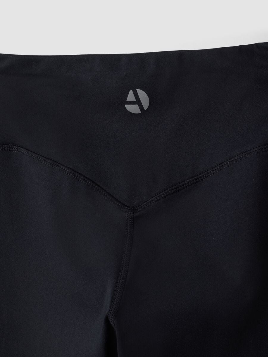 Leggings neri in tessuto elasticizzato a vita alta_9