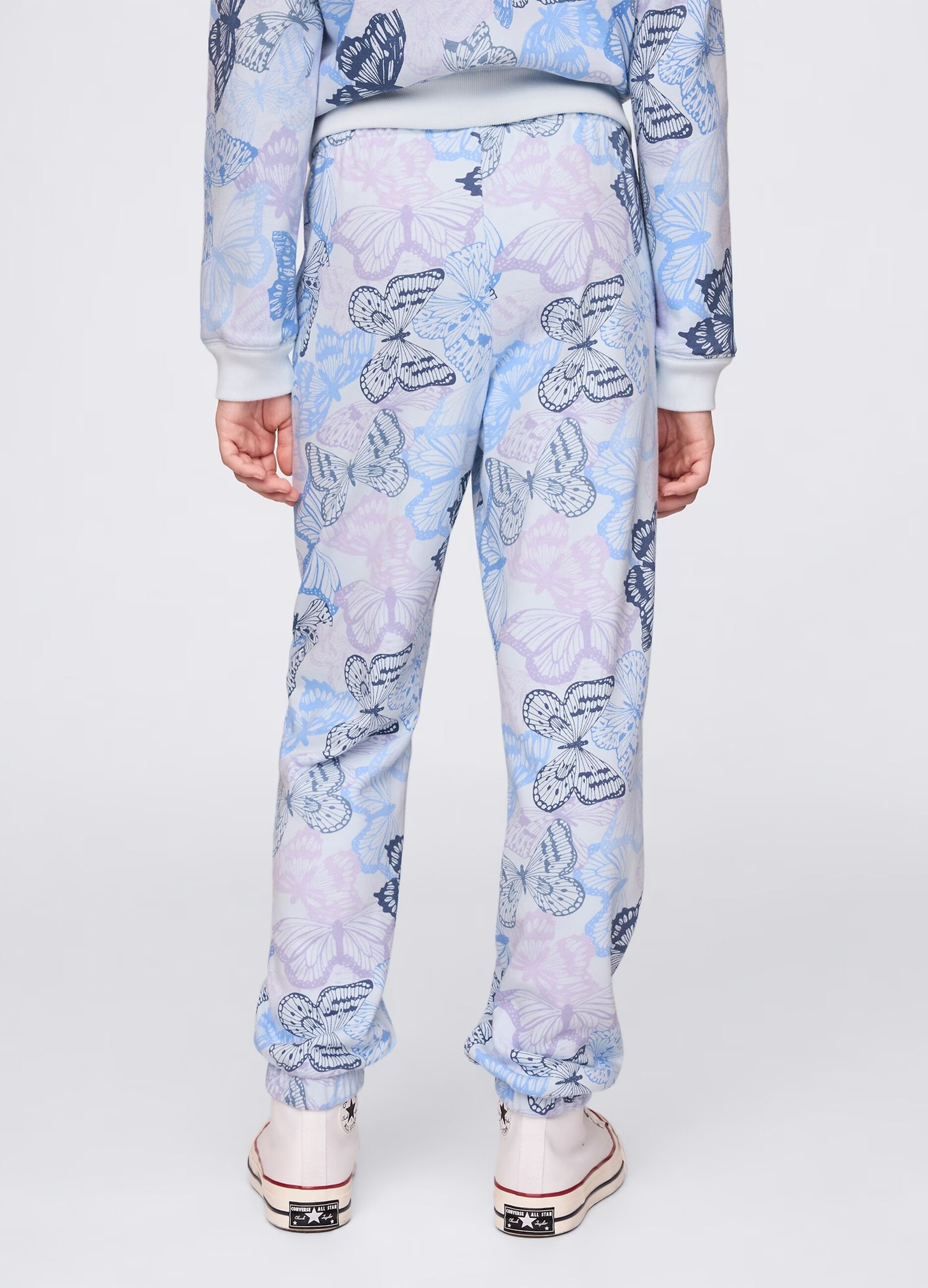 Light blue joggers with drawstring, logo embroidery and butterflies print