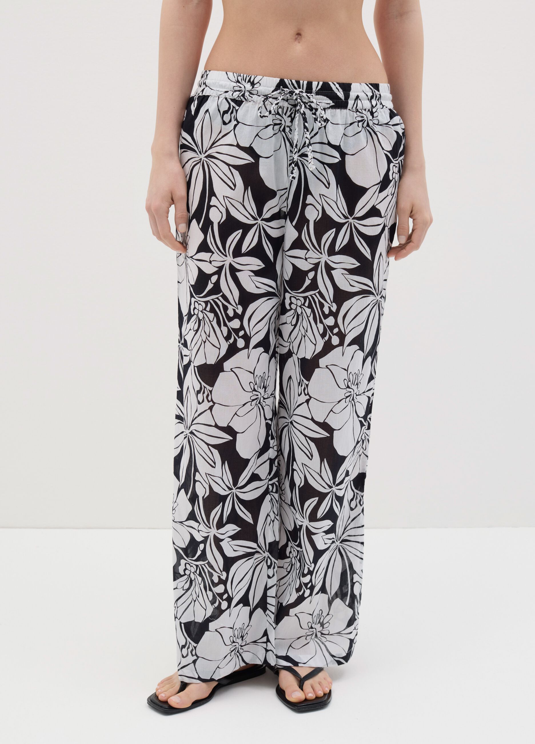 Pantalone lungo copricostume a fiori in cotone