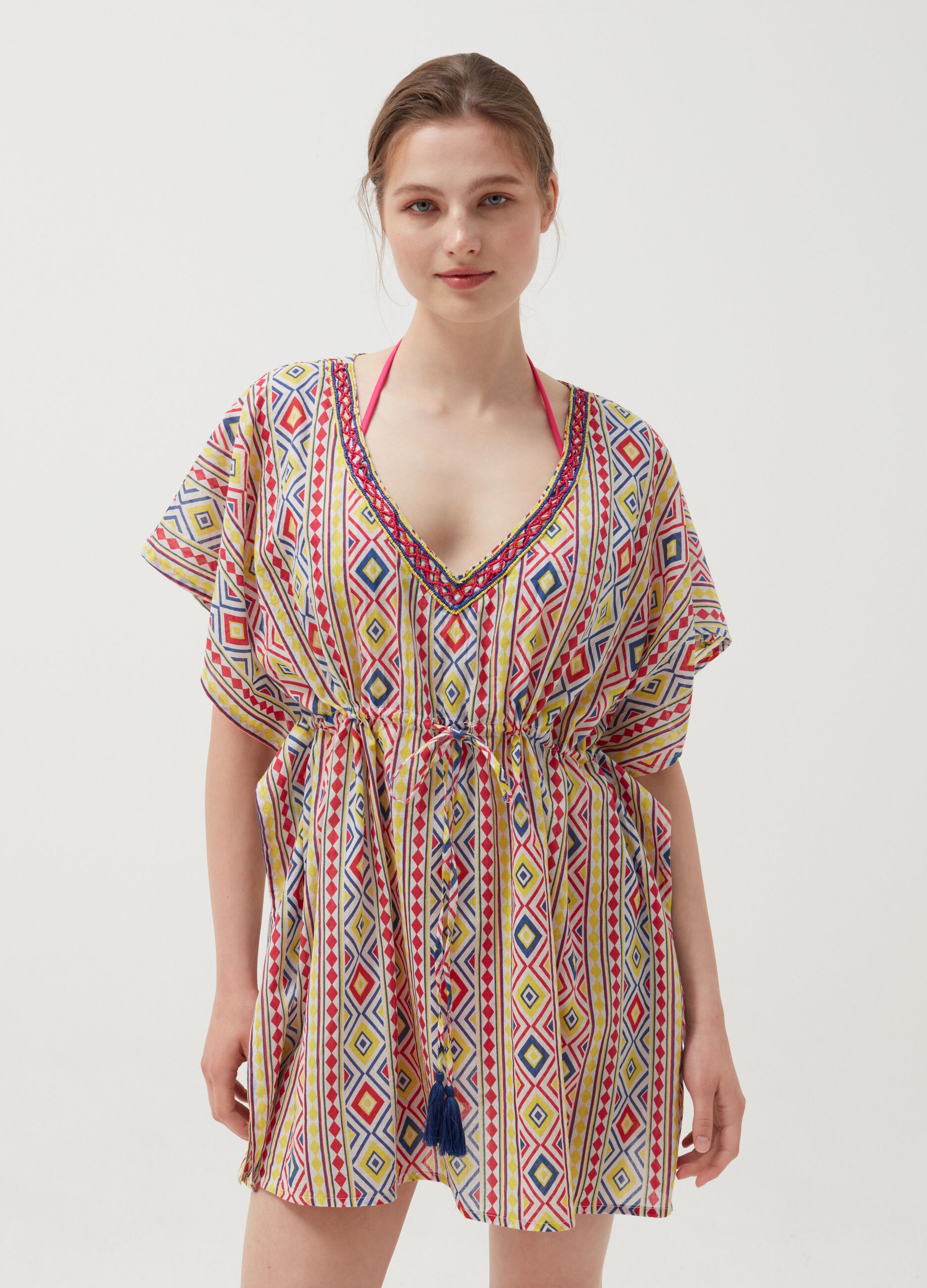 Beach cover-up poncho with ethnic pattern