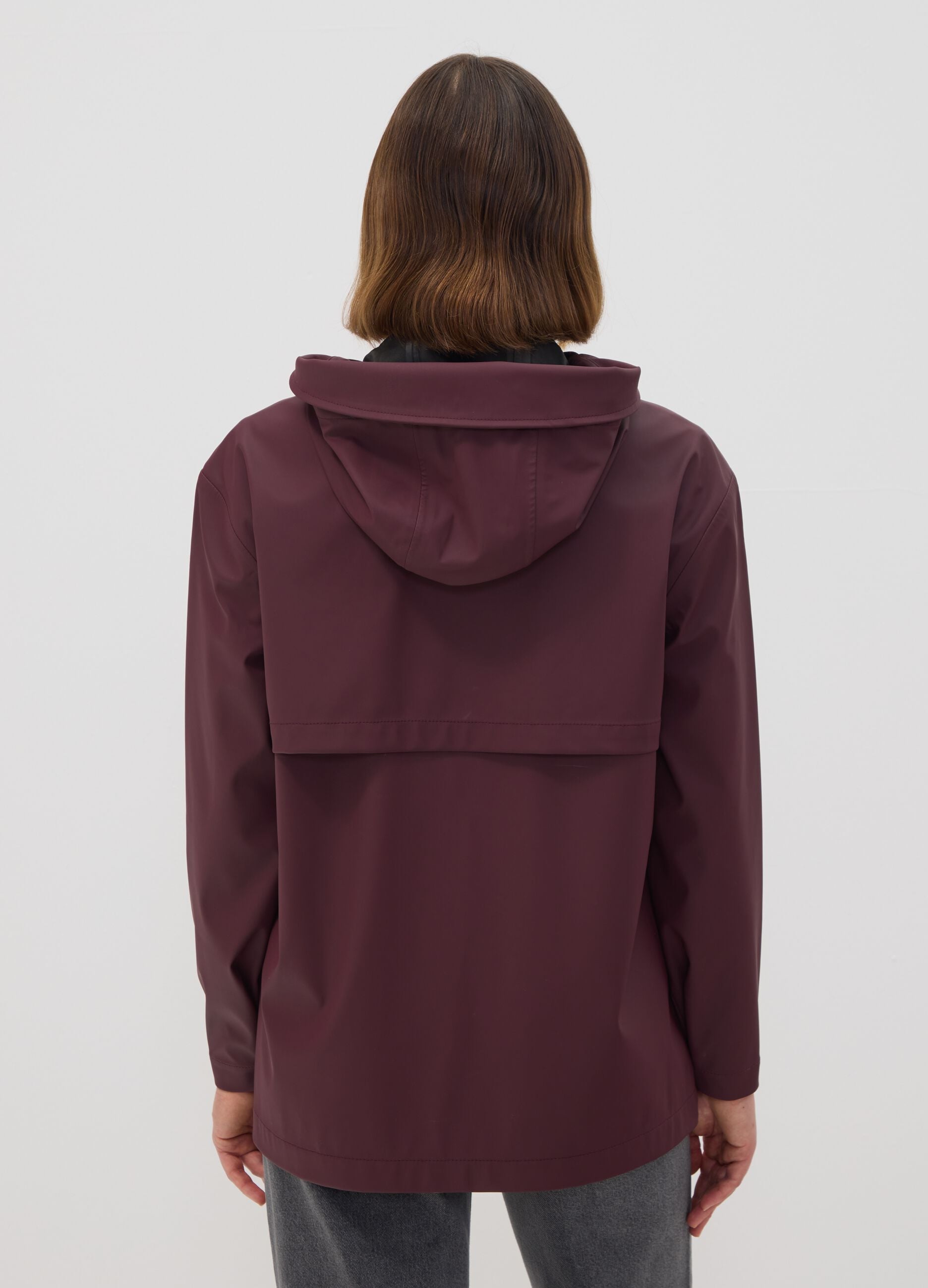 Red rain jacket with zip and hood