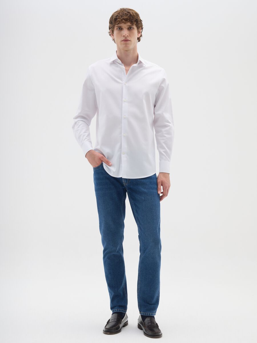 Blue denim jeans in cotton blend slim fit_0