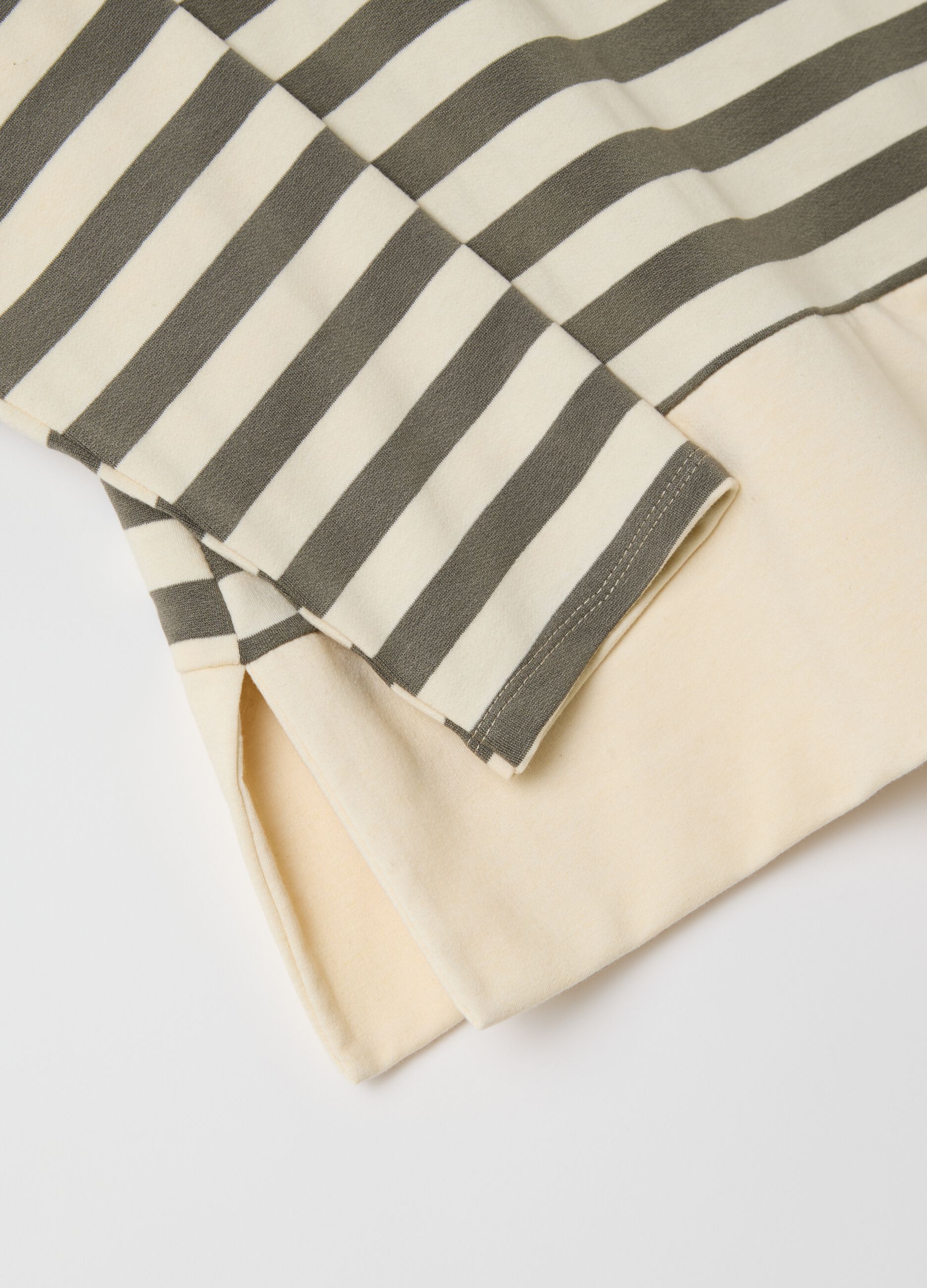 Beige and green striped top with long sleeves
