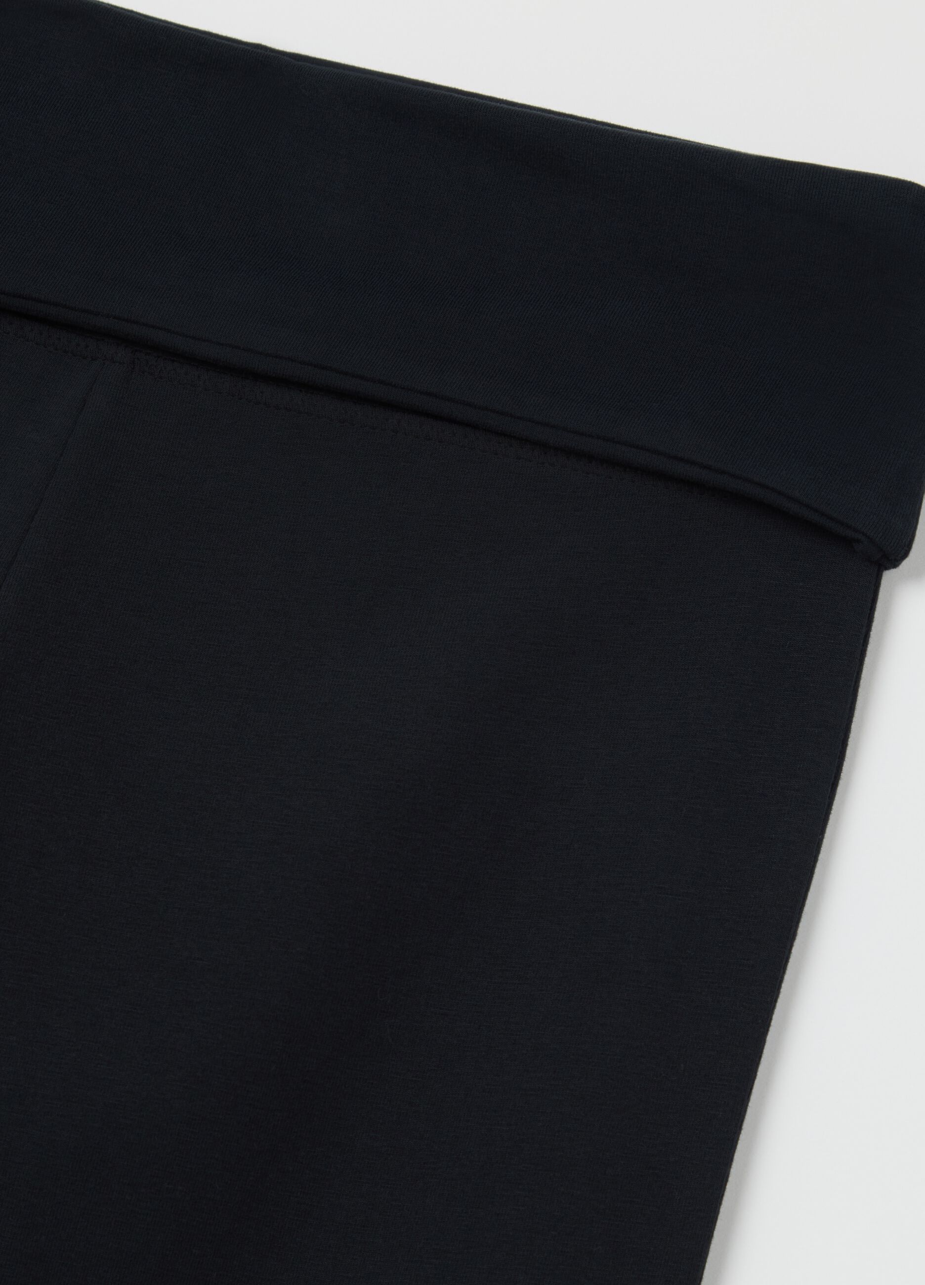 Black flare-fit leggings with striped fold at the waist