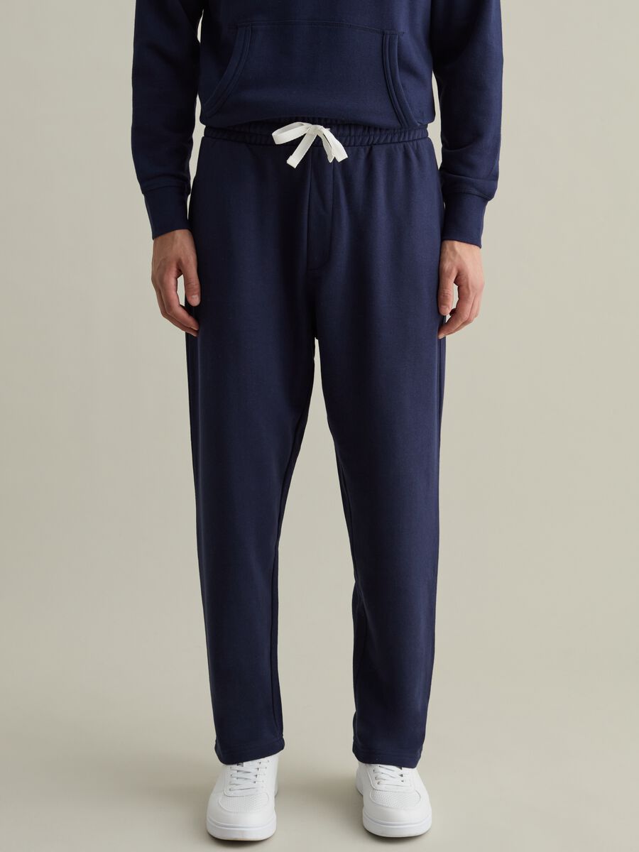 Joggers con coulisse e tasche_1