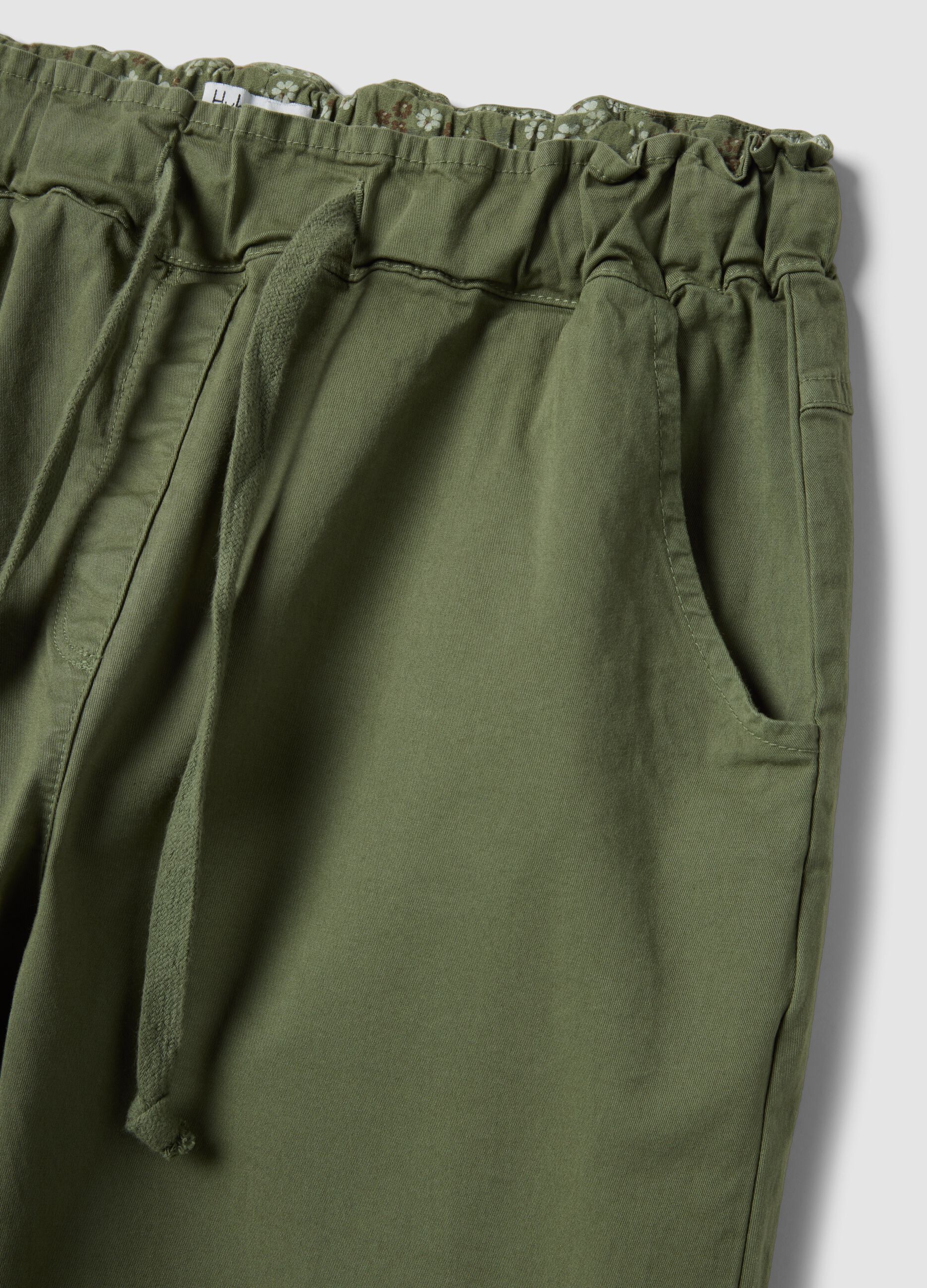 Green stretch-cotton trousers with drawstring