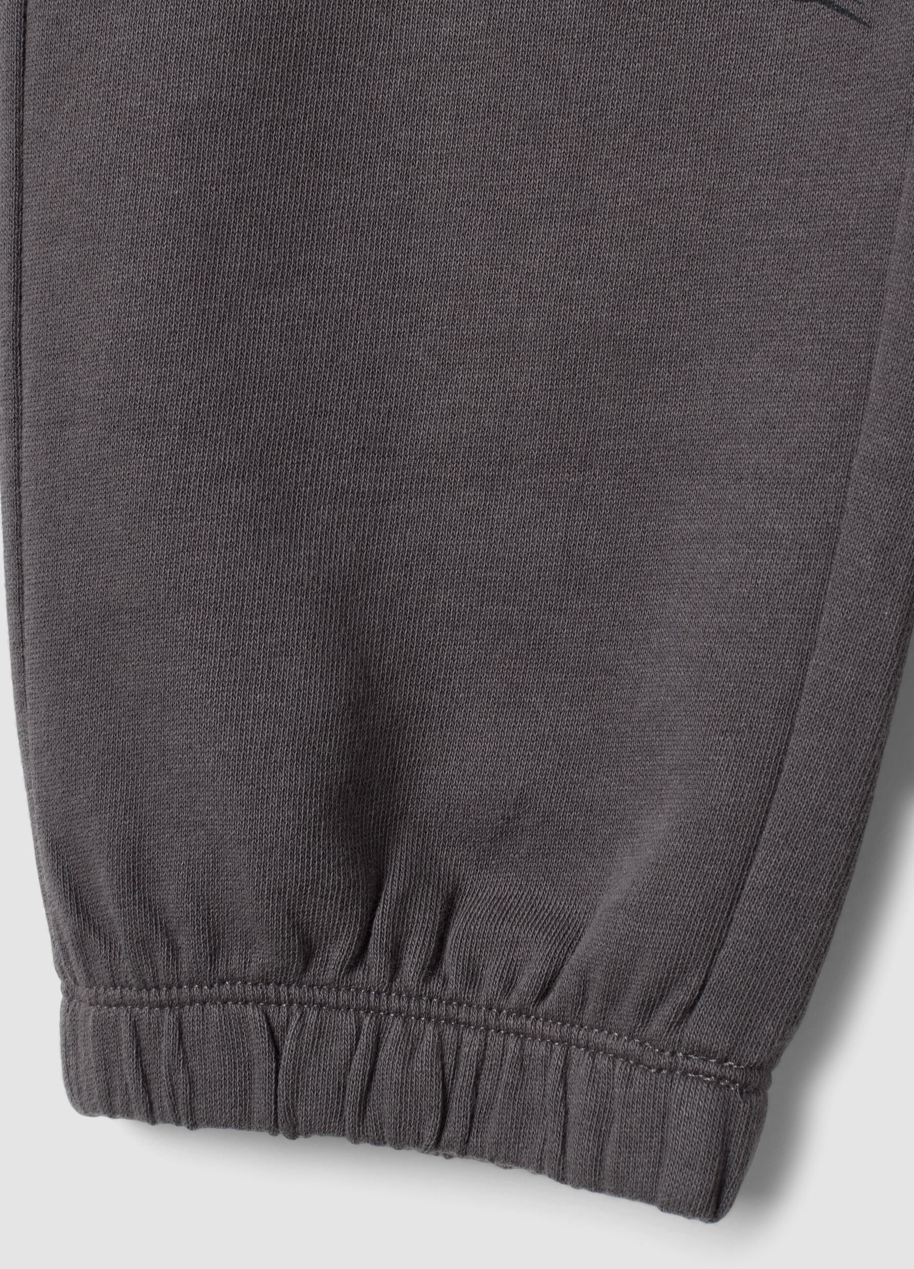 Pantaloni jogger grigi in puro cotone con stampa sportiva