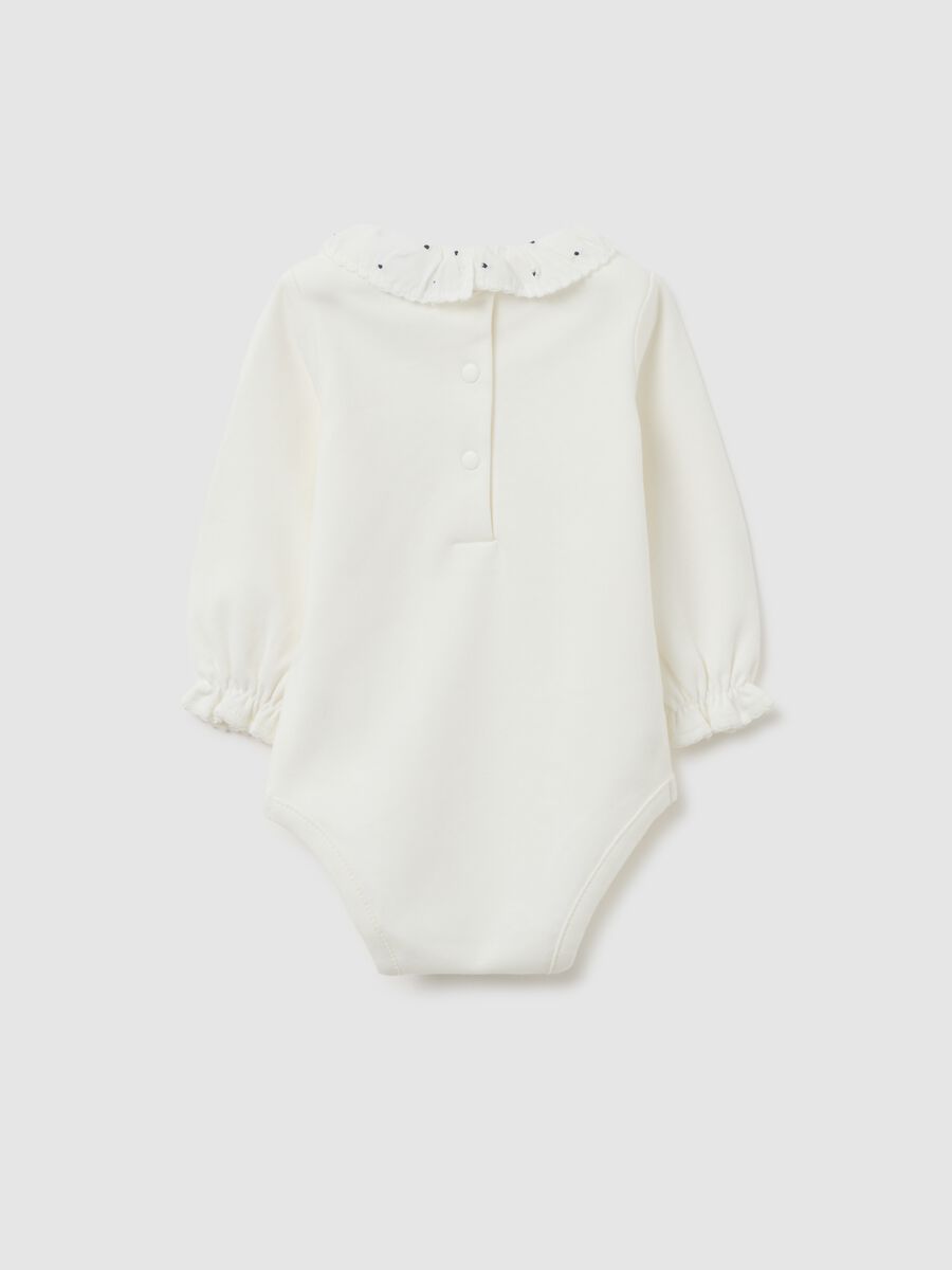 Body bianco da neonata in puro cotone con colletto a volant_1