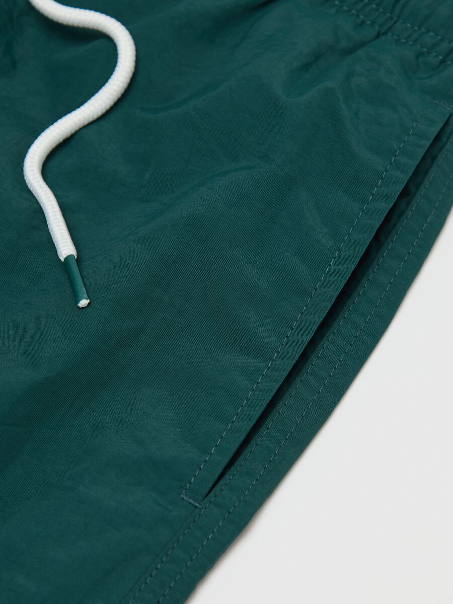 Green mixed fabric swim shorts_5
