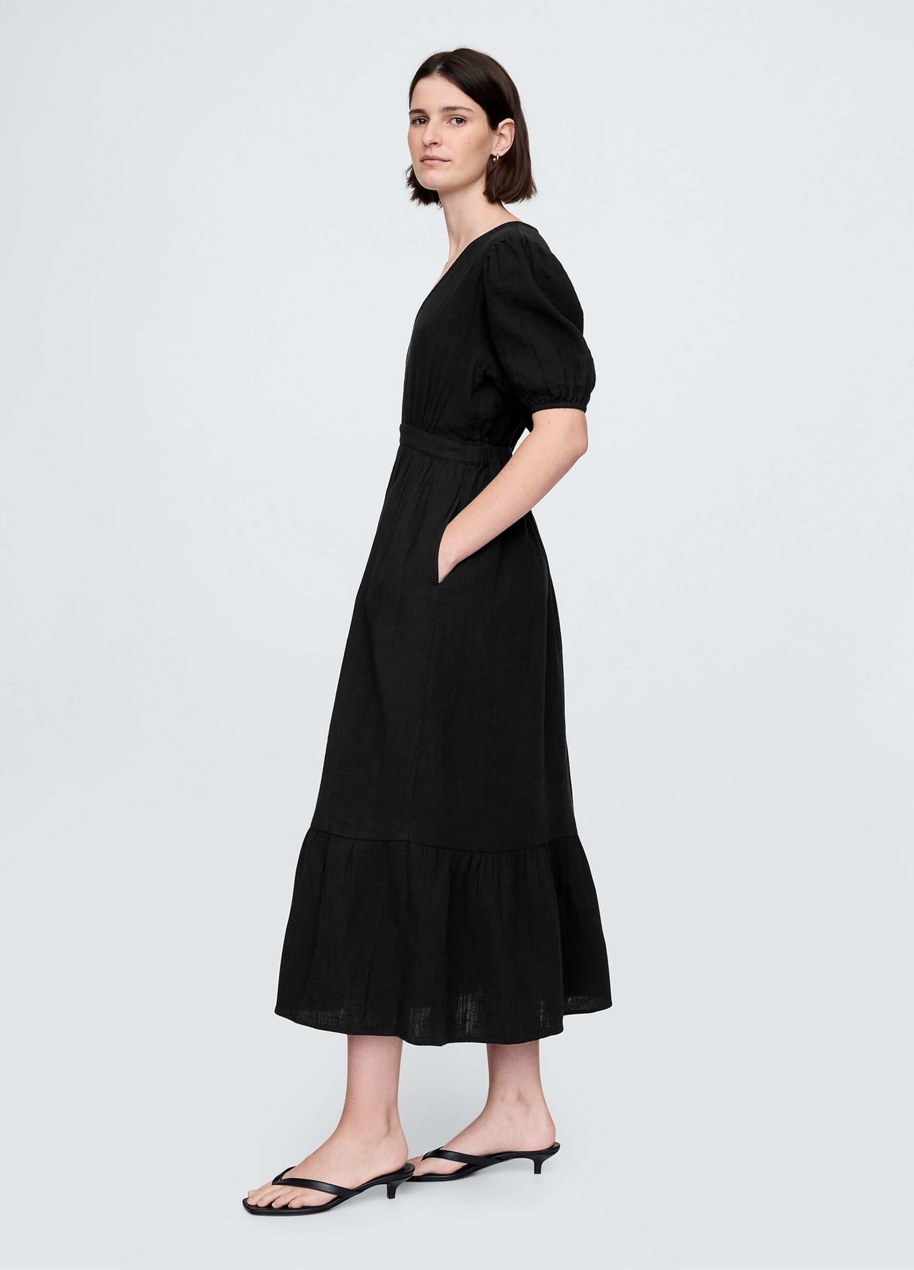 Long black dress with V-neck and open back