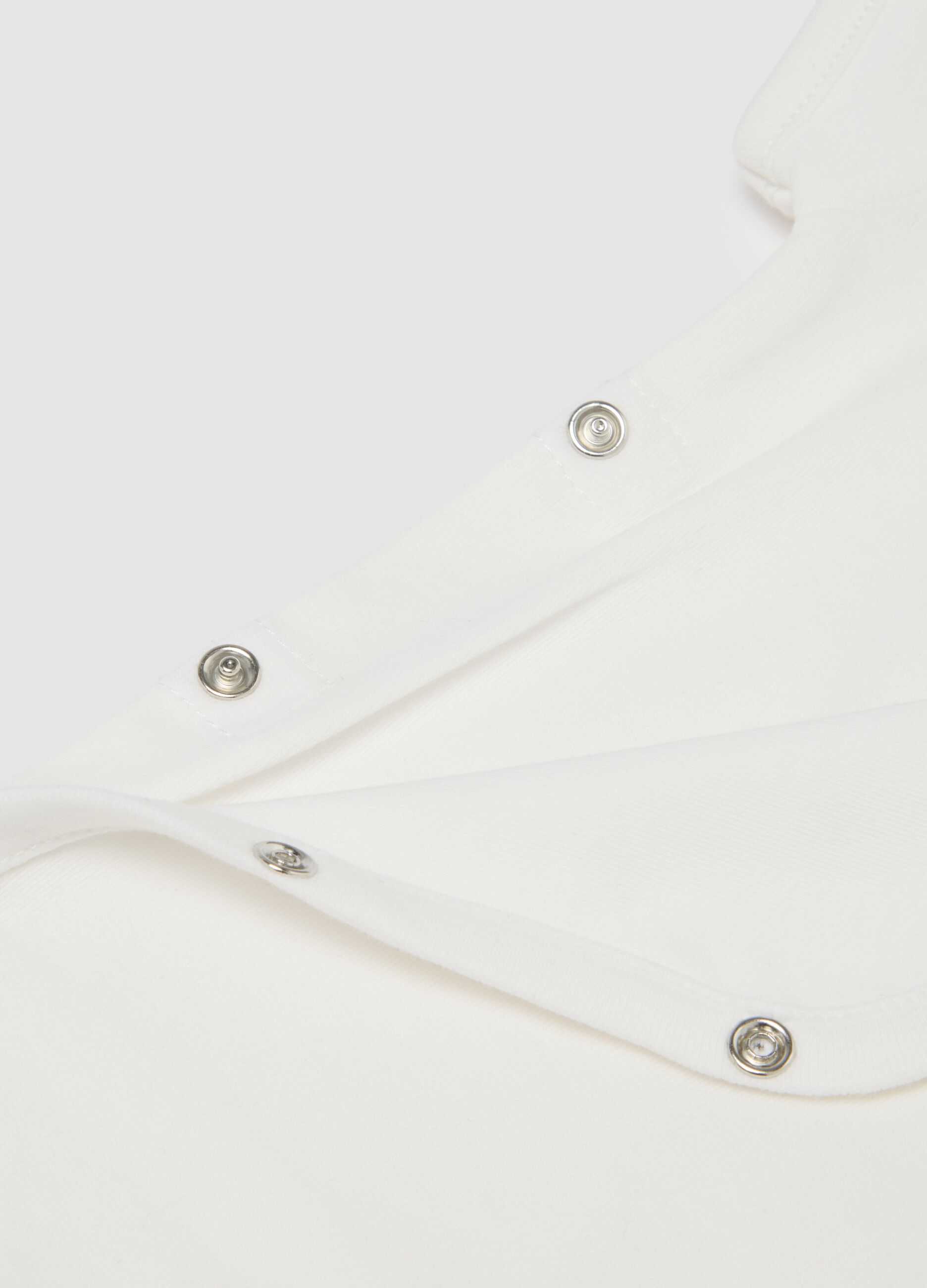 White and beige cotton bodysuit
