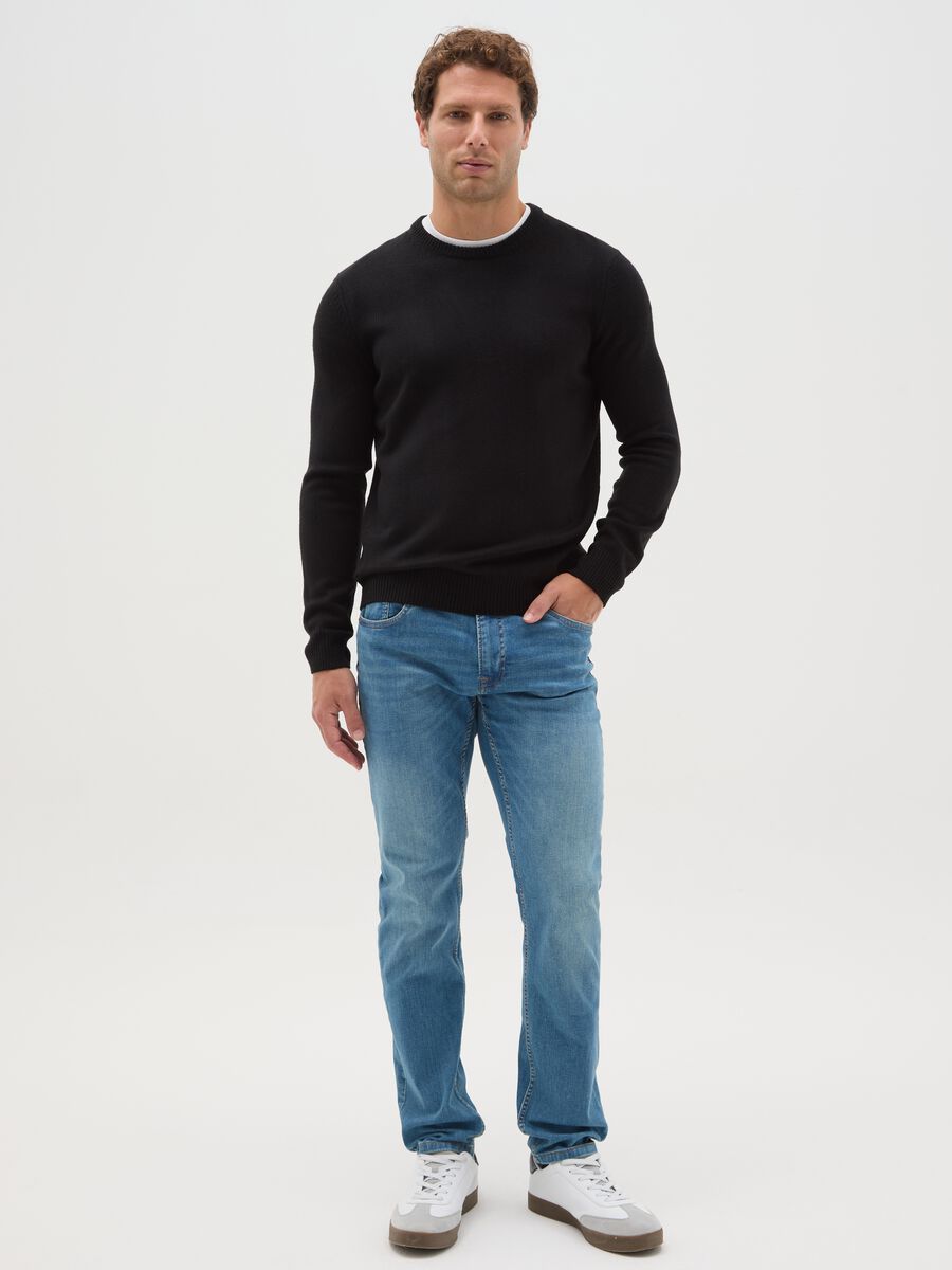 Jeans azzurri in denim slim fit_0