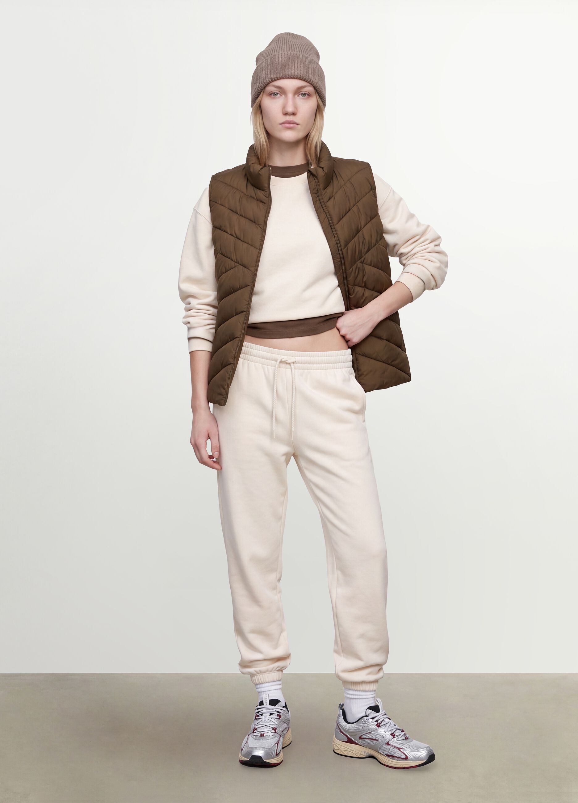 Green ultralight quilted gilet with zip and high neck