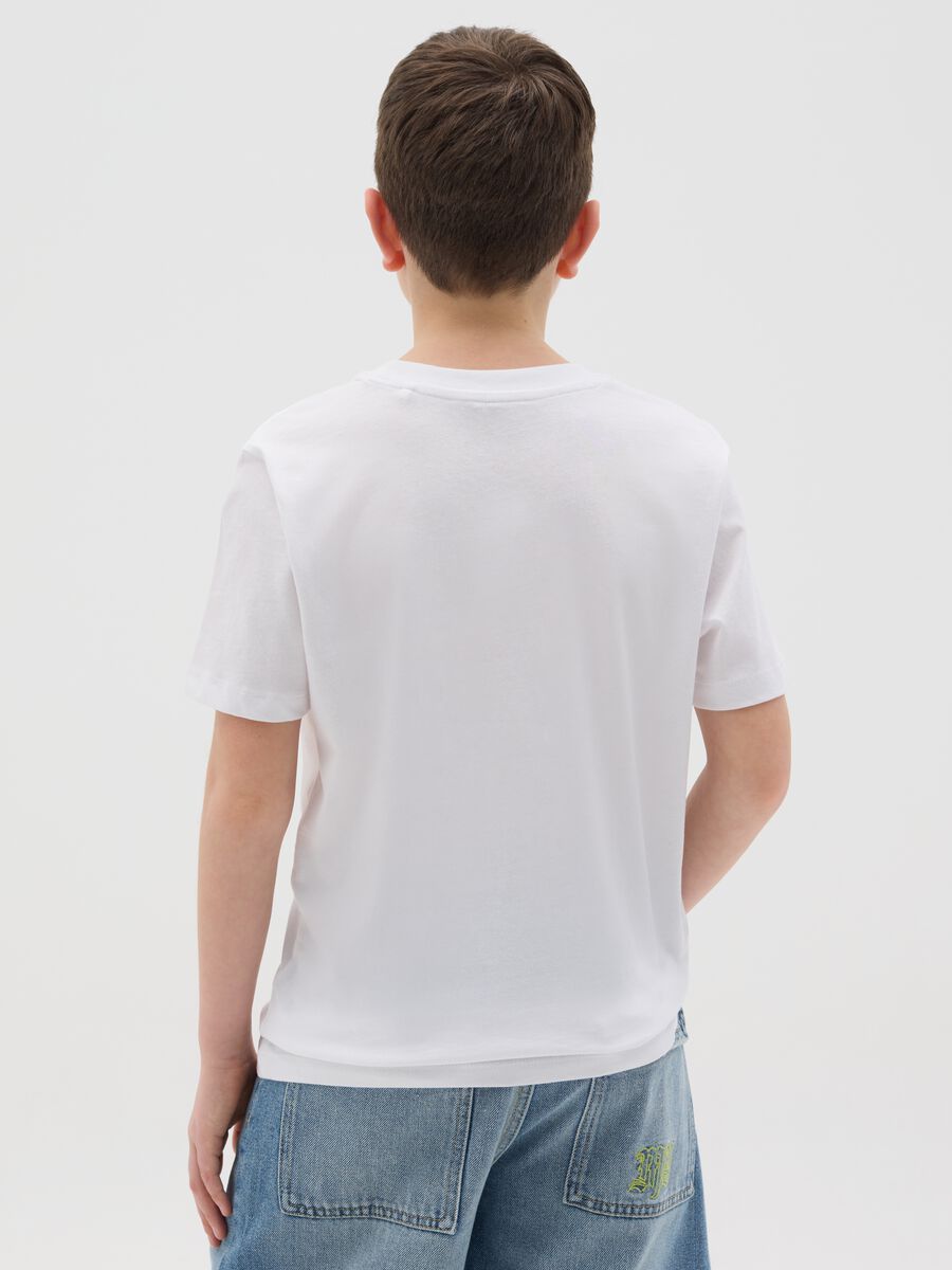 T-shirt in cotone con stampa ragazzo skater_2