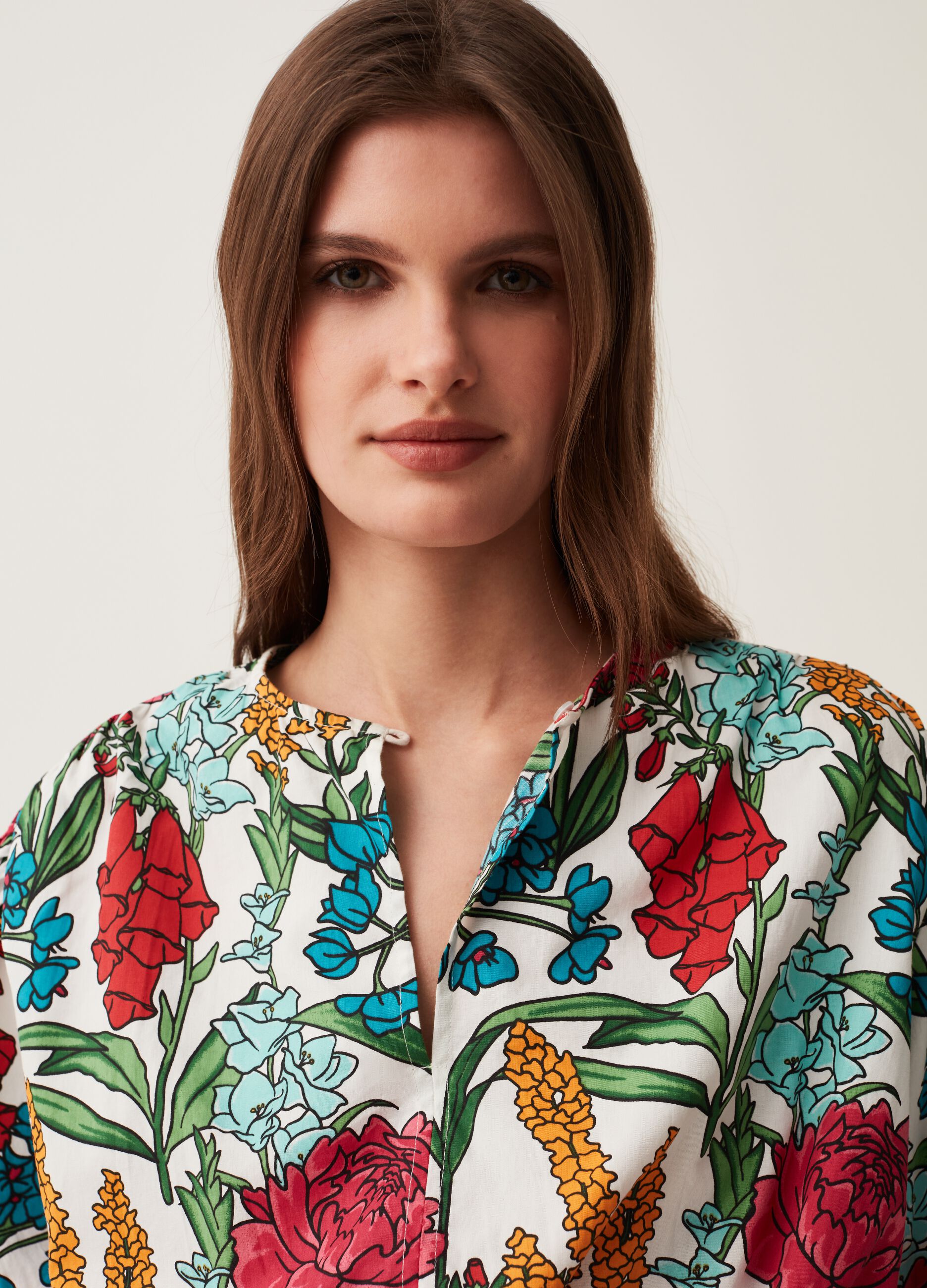 Blusa crop in cotone maniche a sbuffo_1