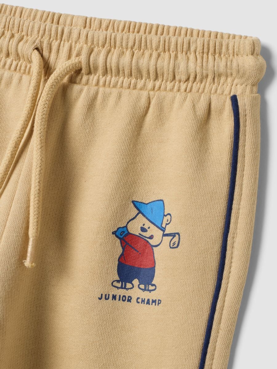 Pantaloni jogger beige in puro cotone con stampa_2
