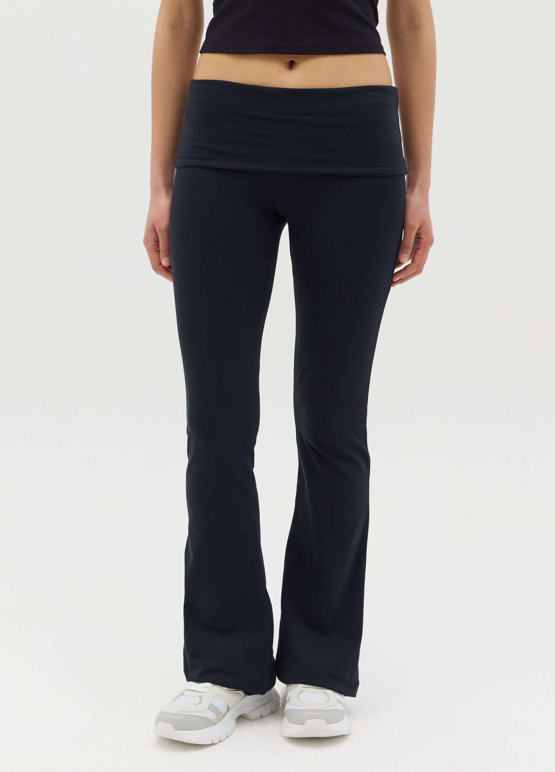 Black flare-fit leggings with striped fold at the waist