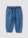 Blue denim trousers in a cotton and viscose blend with an elasticated waistband_0