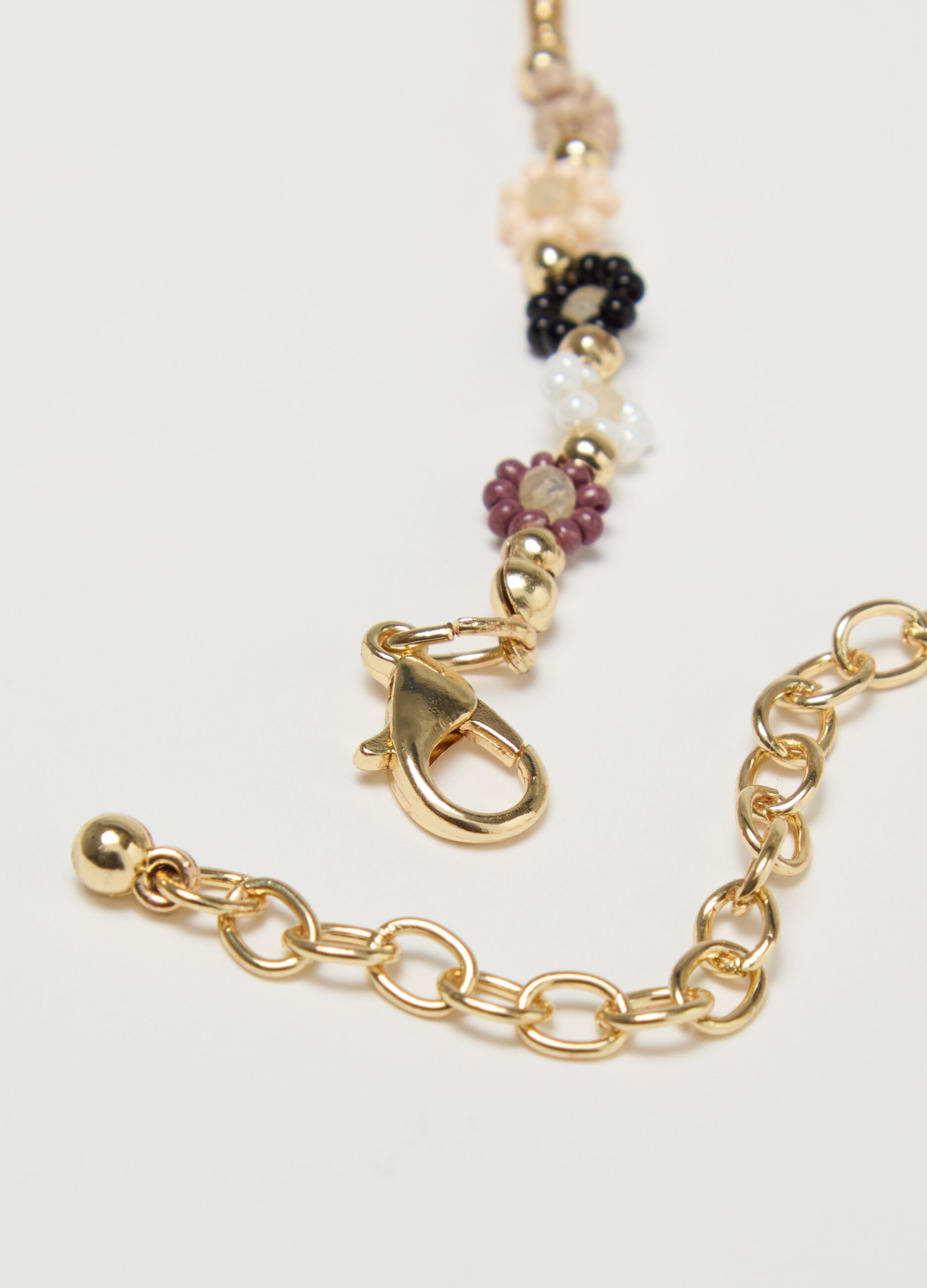 Collana girocollo con perline e fiorellini