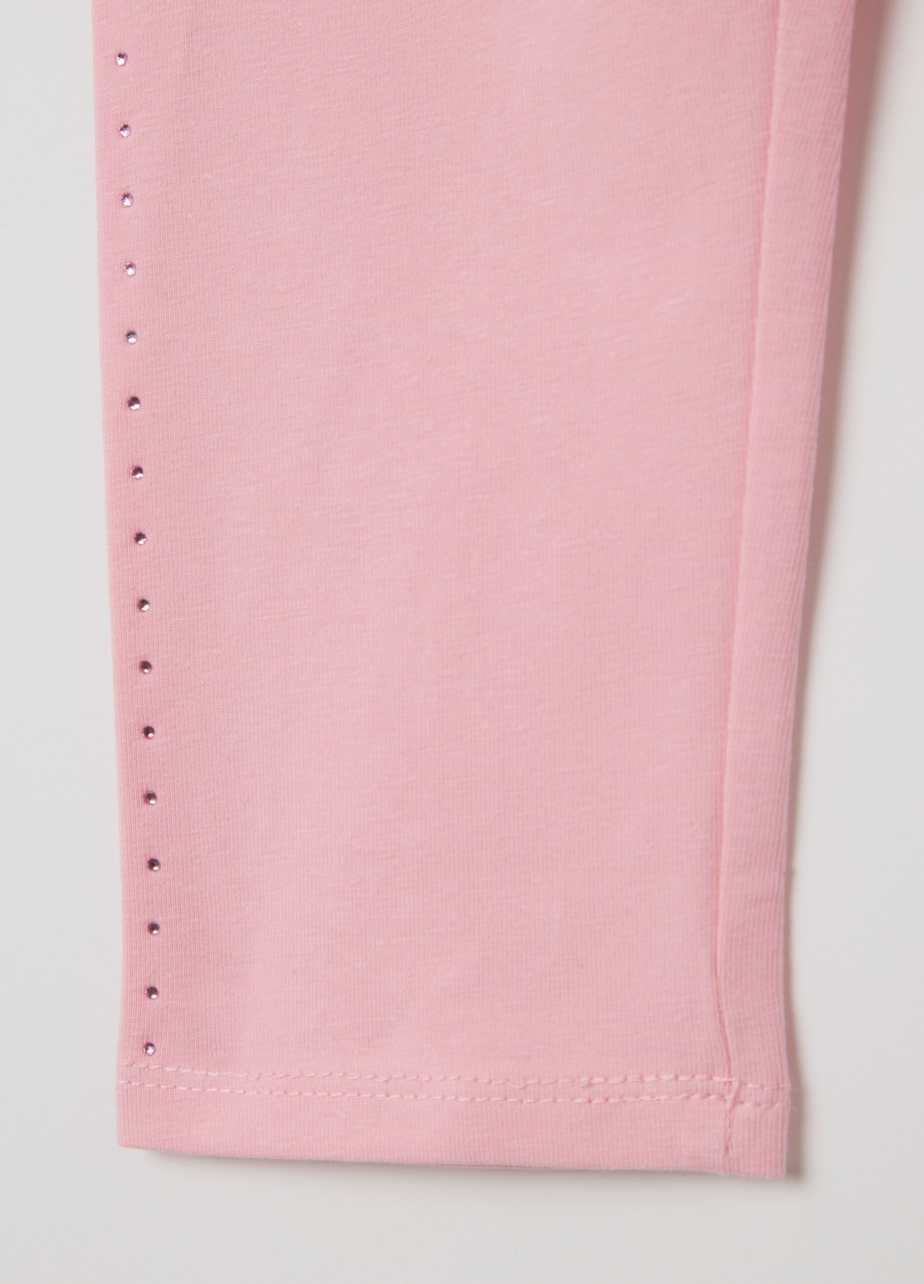 Leggings rosa a tre quarti in cotone stretch con strass