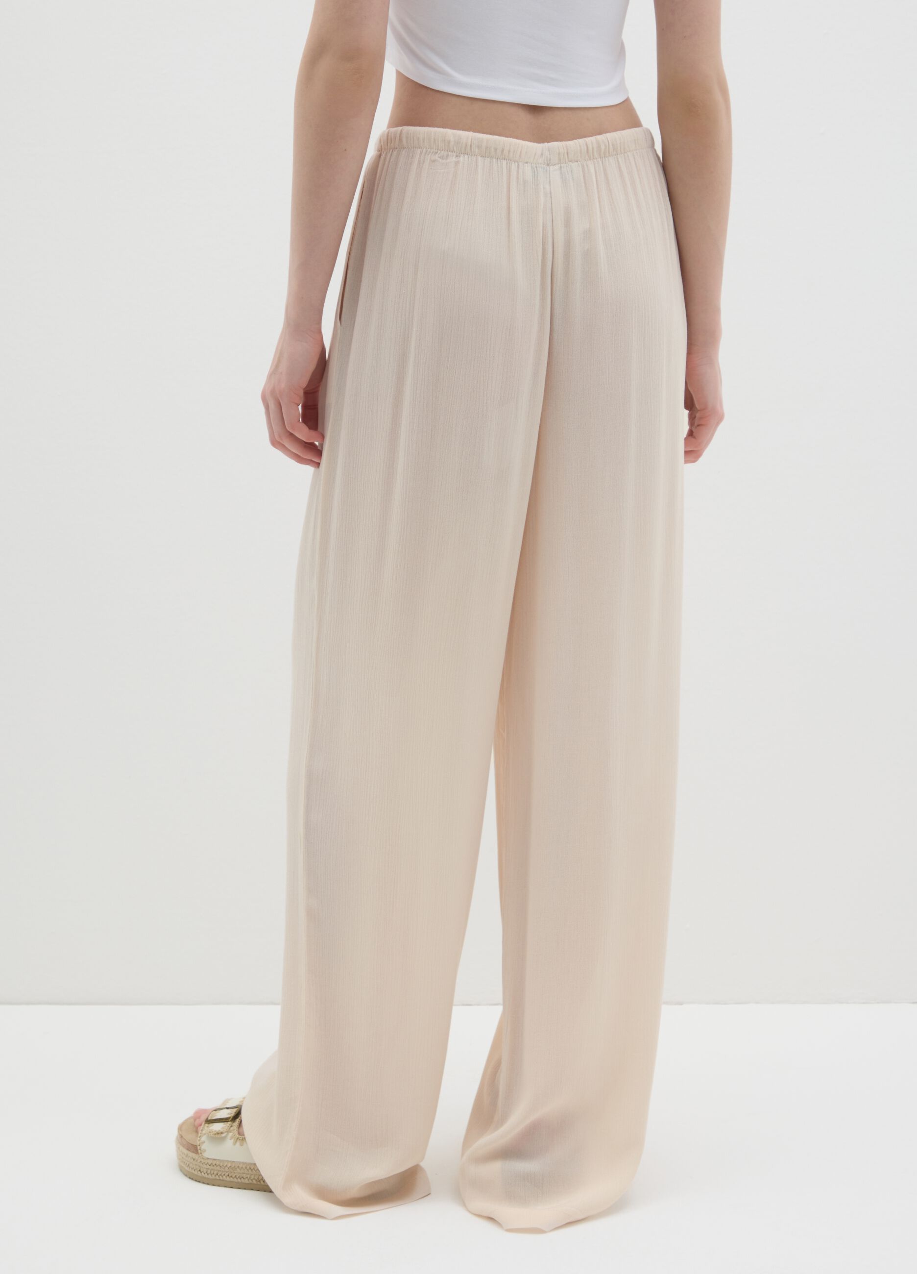 Women's beige relaxed-fit trousers in 100% viscose