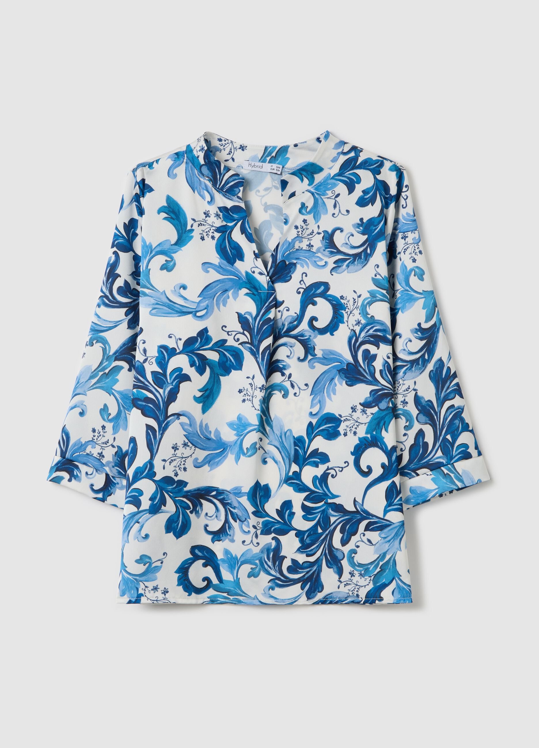 White and blue blouse with print