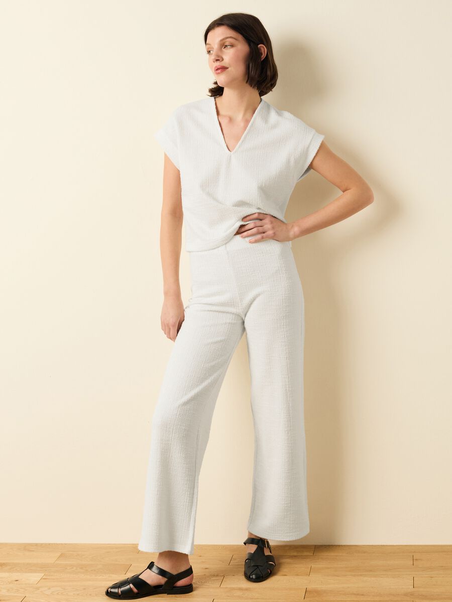 Wide-leg trousers with woven design_0