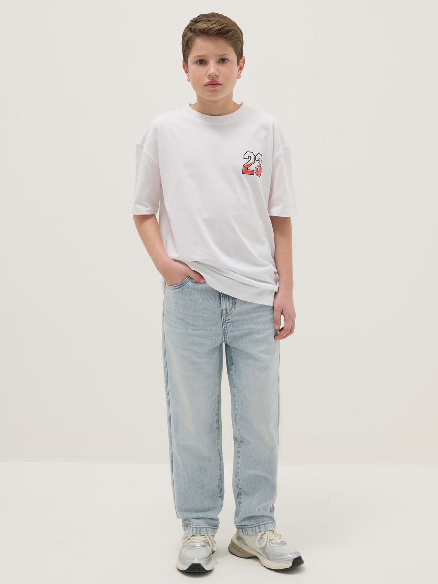 Jeans in puro cotone denim azzurro da ragazzo relaxed fit_0