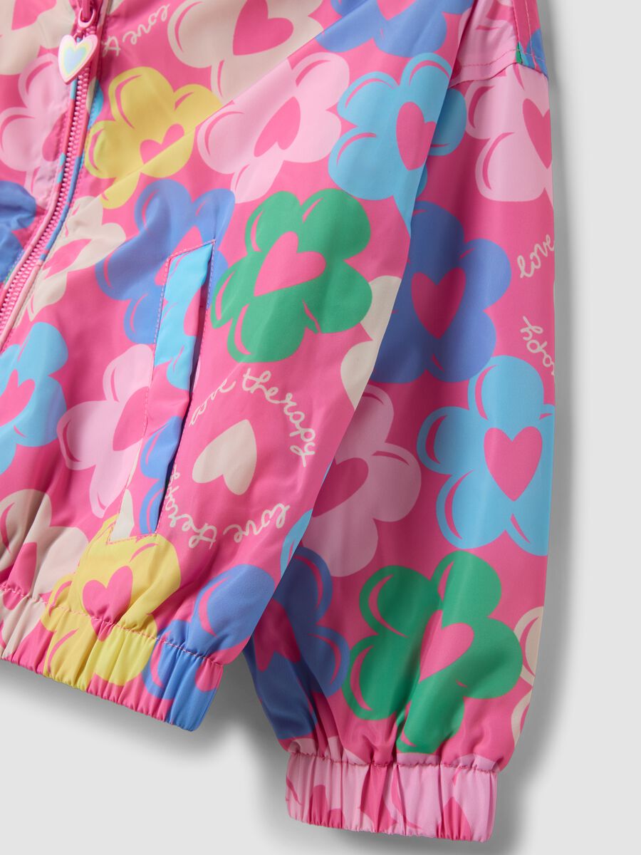 Giubbotto antipioggia multicolor imbottito con fantasia floreale per bambina_3
