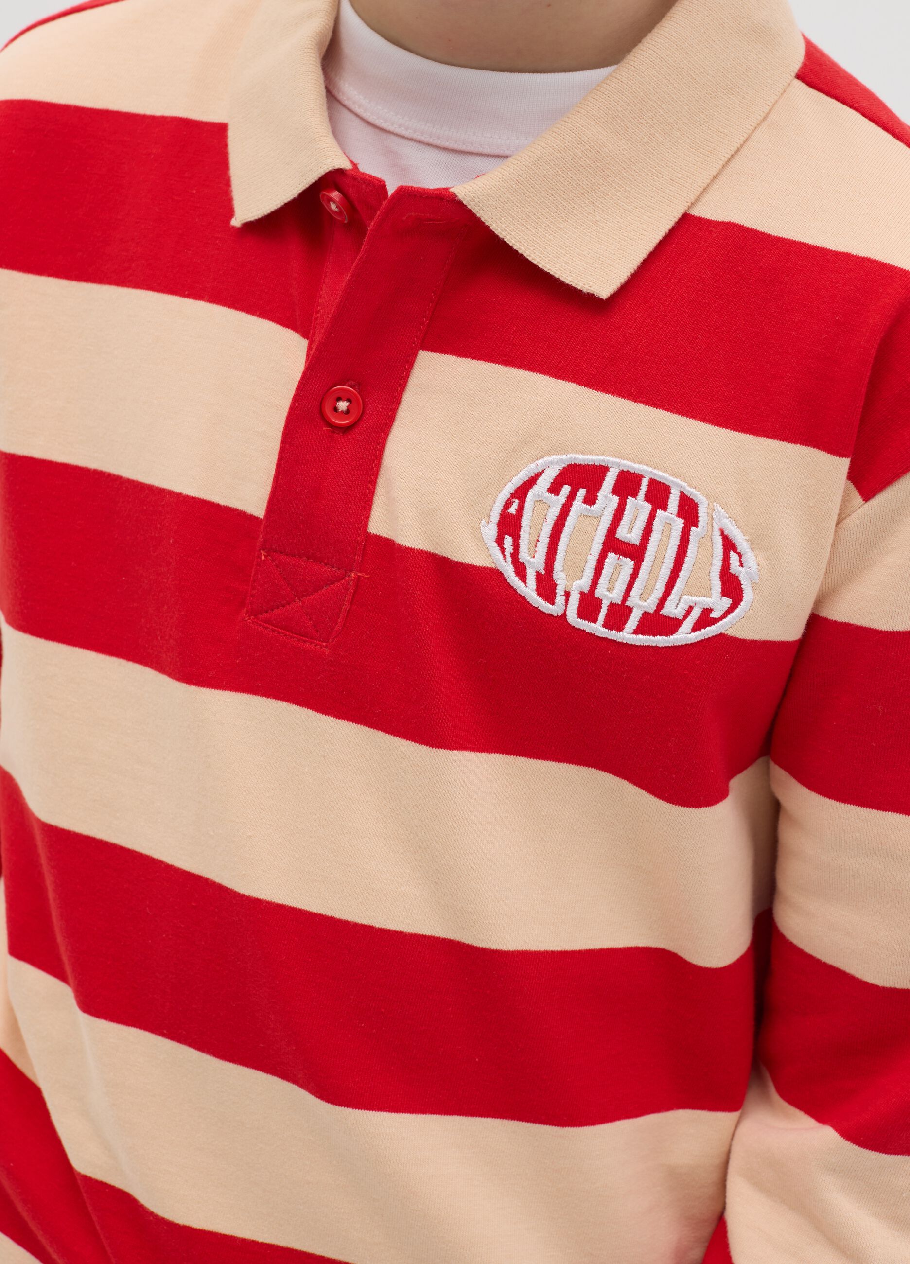 Long-sleeved polo shirt with striped pattern and "ATHLS" embroidery