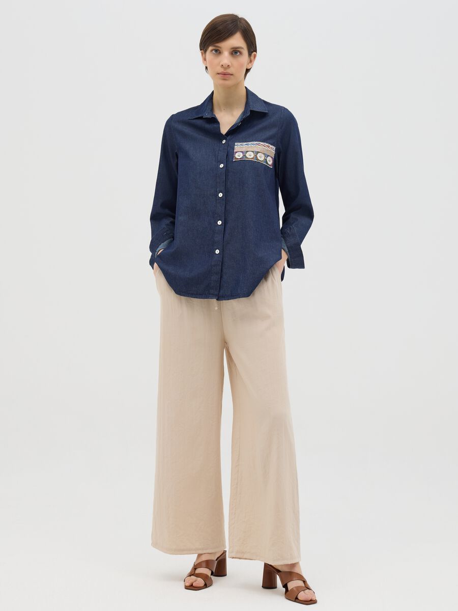 Denim shirt with sequinned patch_1