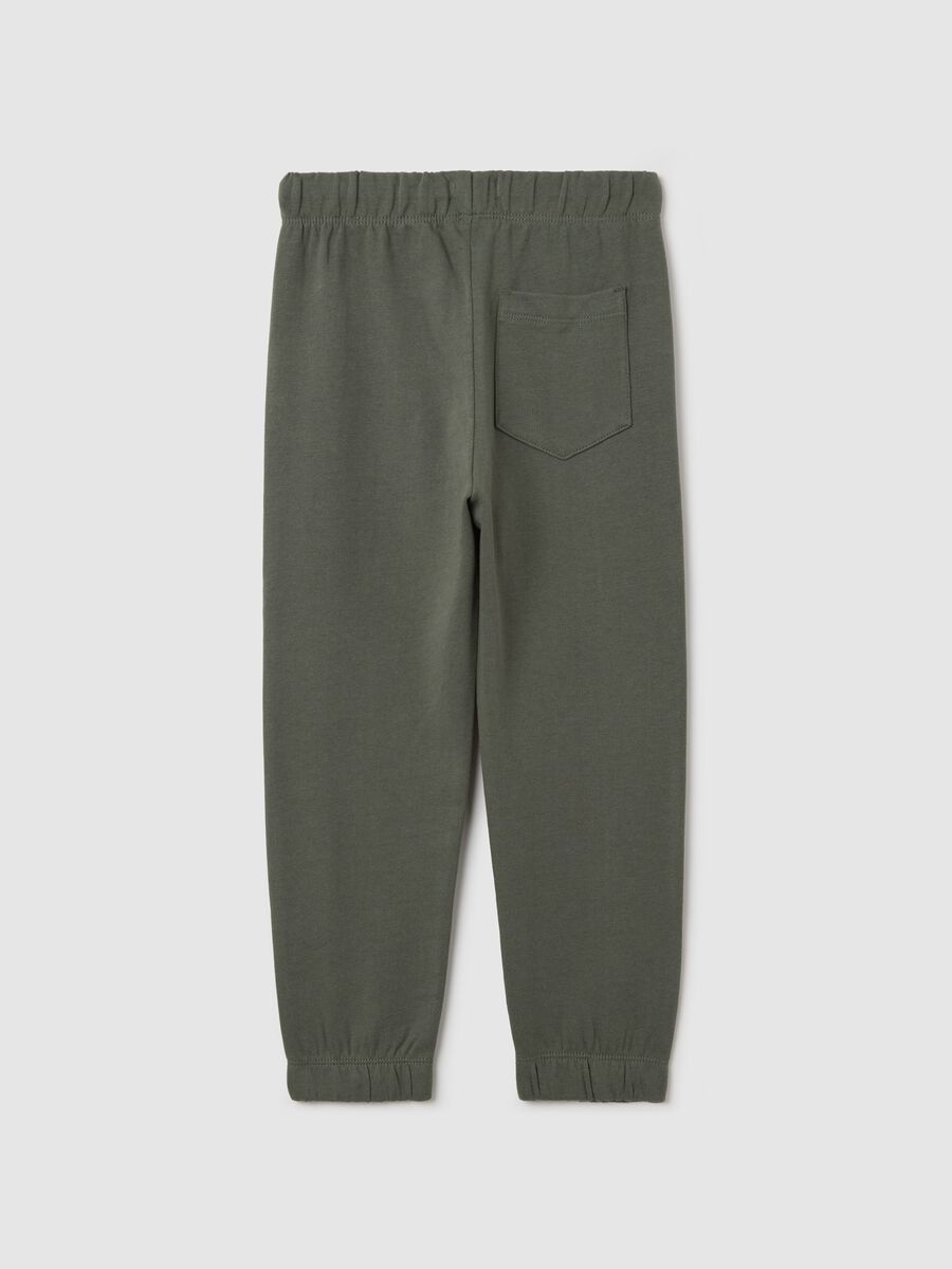 Green cotton joggers with drawstring and print_1