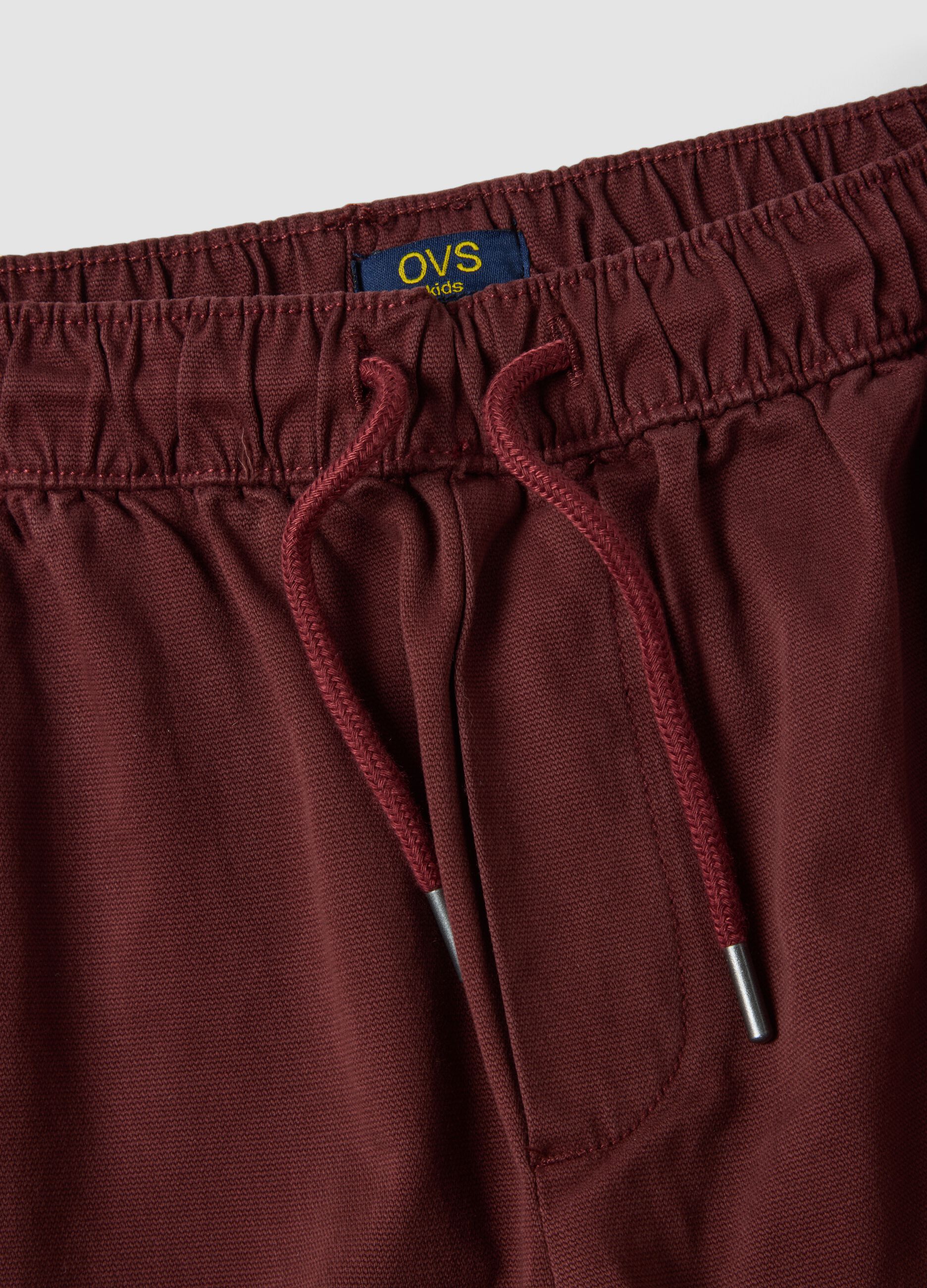 Red stretch cotton joggers with elasticated cuffs, comfort fit
